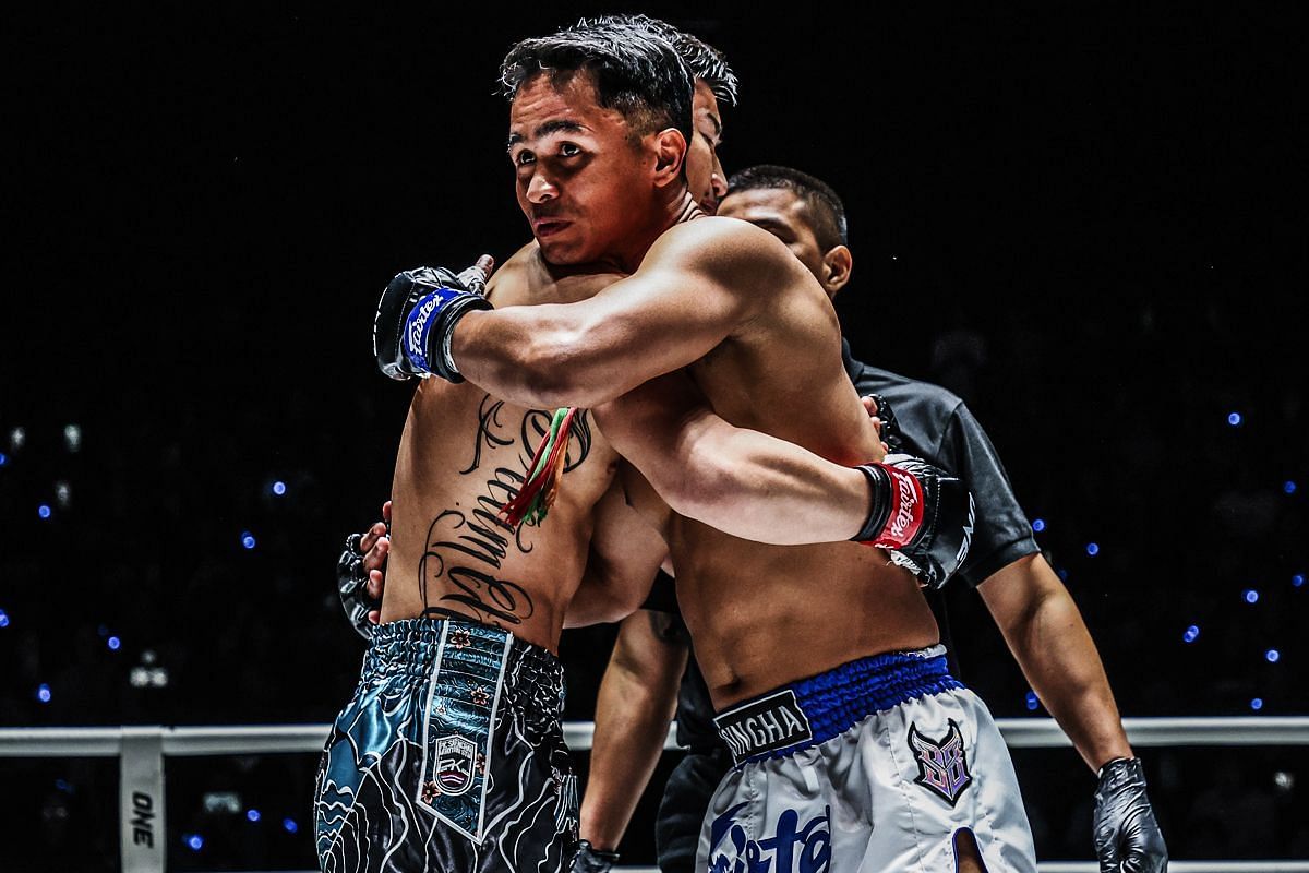 Tawanchai PK Saenchai huggng Superbon | Image credit: ONE Championship