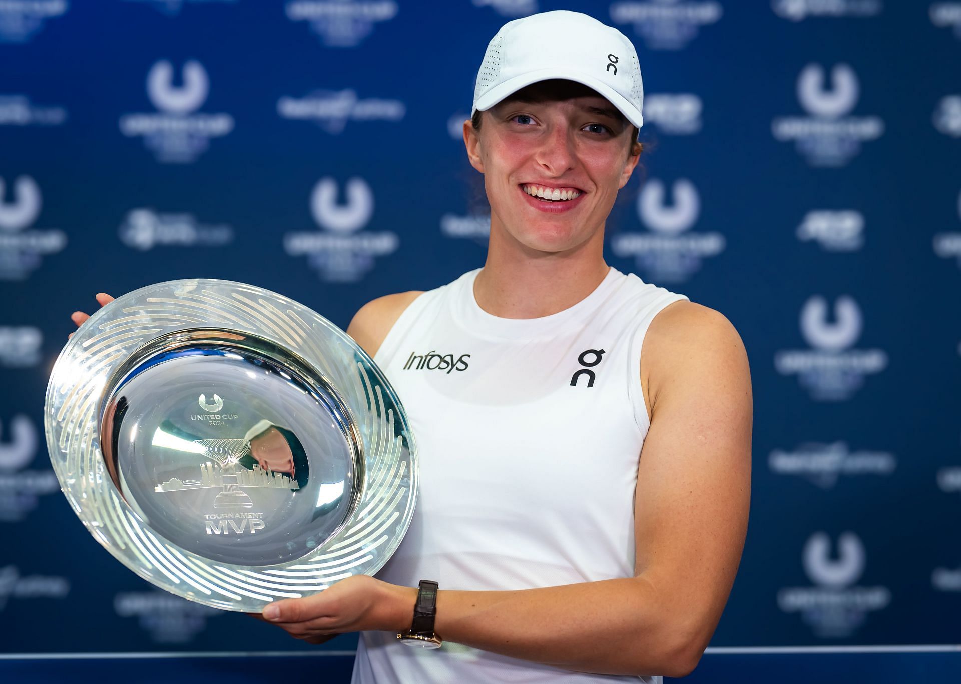 The WTA World No. 2 tennis player Iga Swiatek with the MVP award at the 2024 United Cup (Image: Getty)