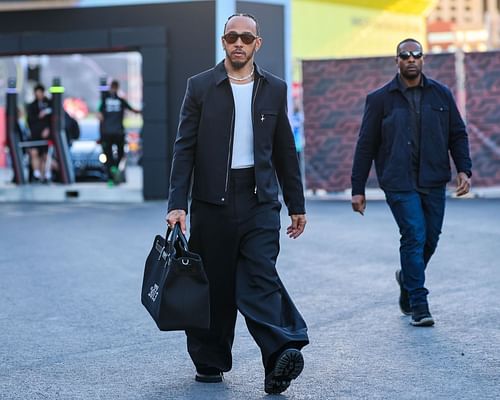 Lewis Hamilton of Great Britain and Mercedes arrives in the paddock - Source: Getty Images