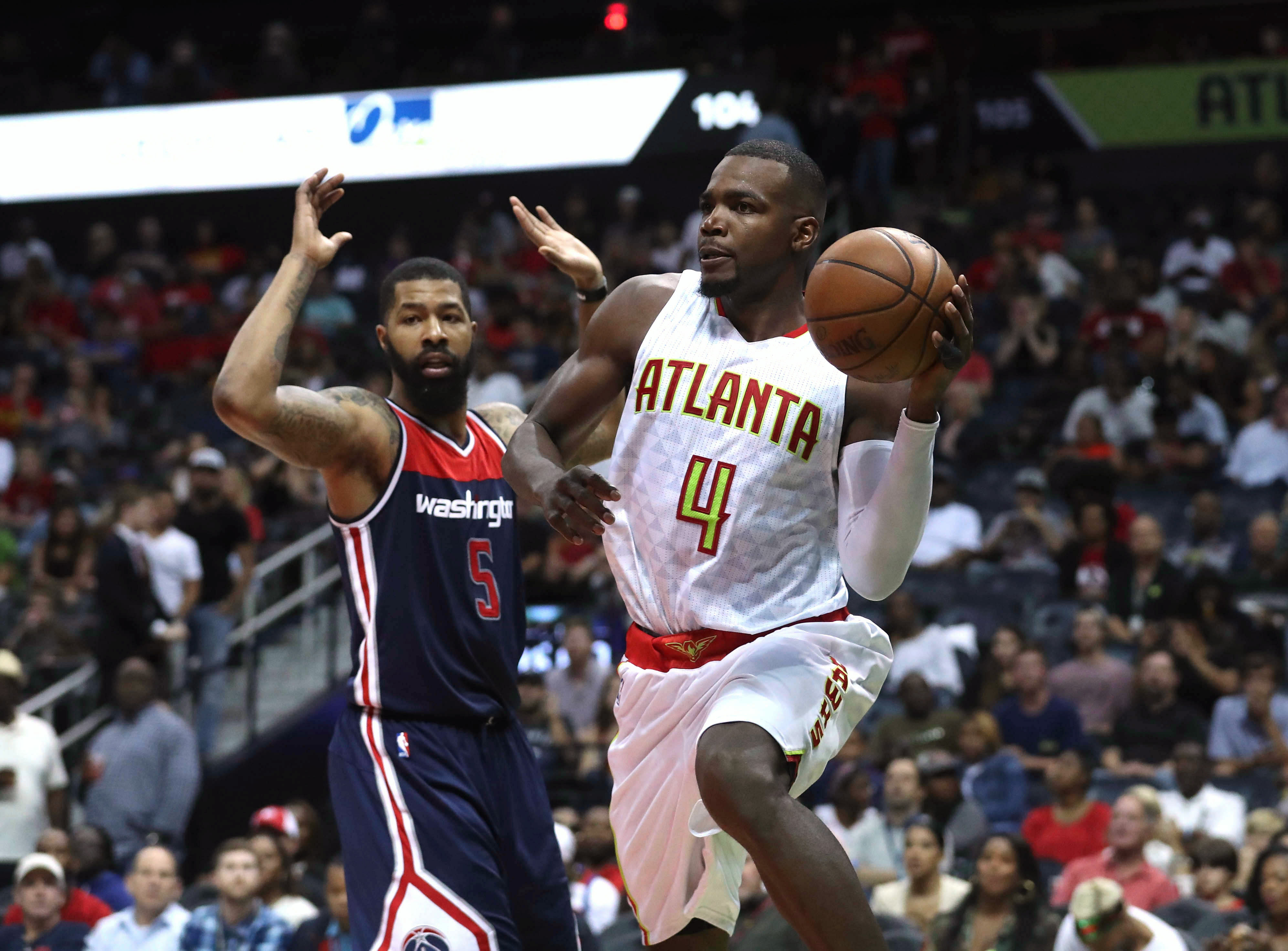 Atlanta Hawks forward Paul Millsap (4) passes away from the defense of Washington Wizards - Source: Imagn