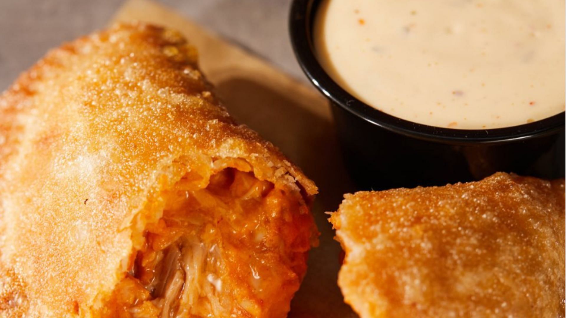 Taco Bell&#039;s cheesy chicken crispanada (Image via Instagram/@tacobell)