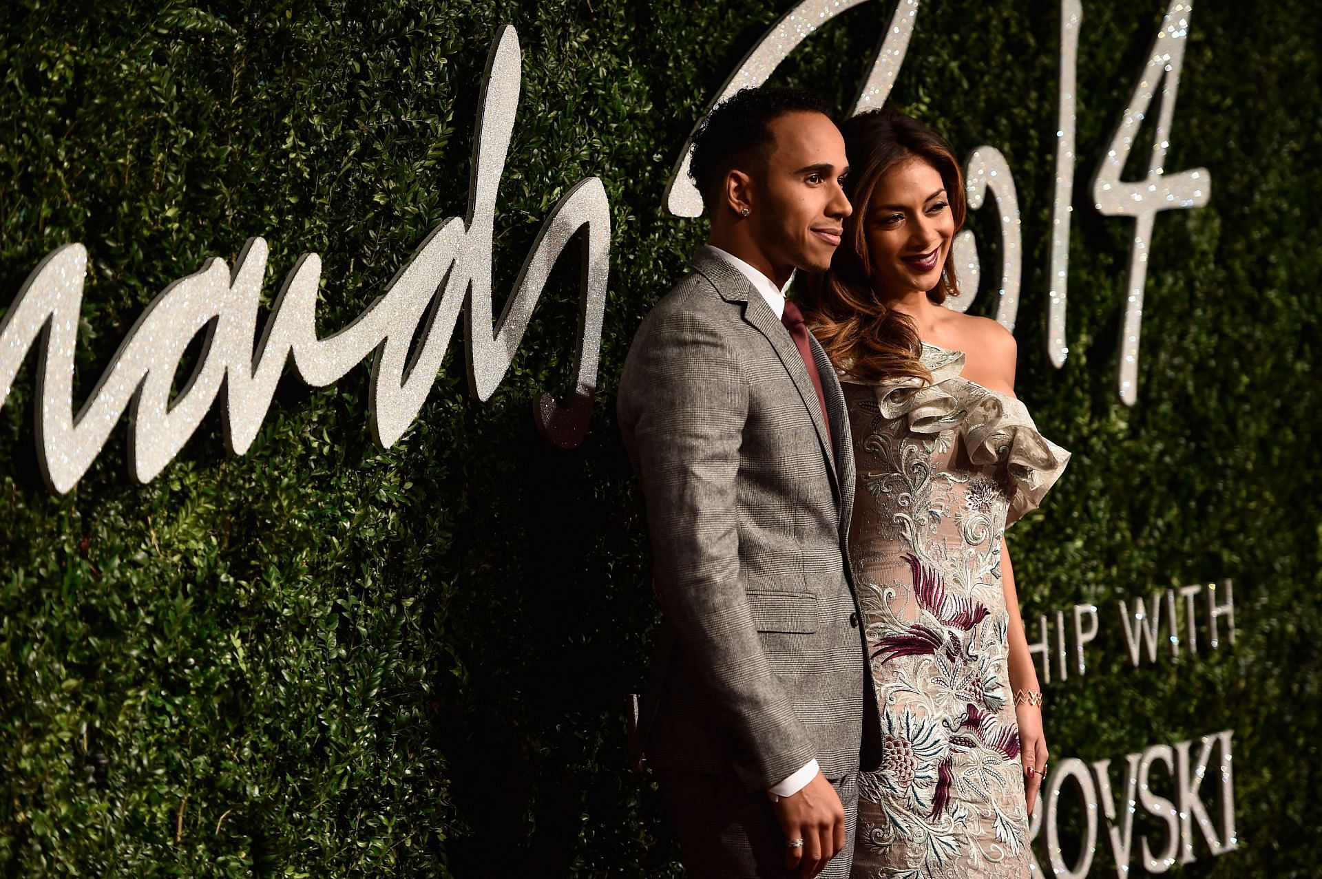 Lewis Hamilton and Nicole Scherzinger attend the British Fashion Awards at London Coliseum on December 1, 2014 - Source: Getty