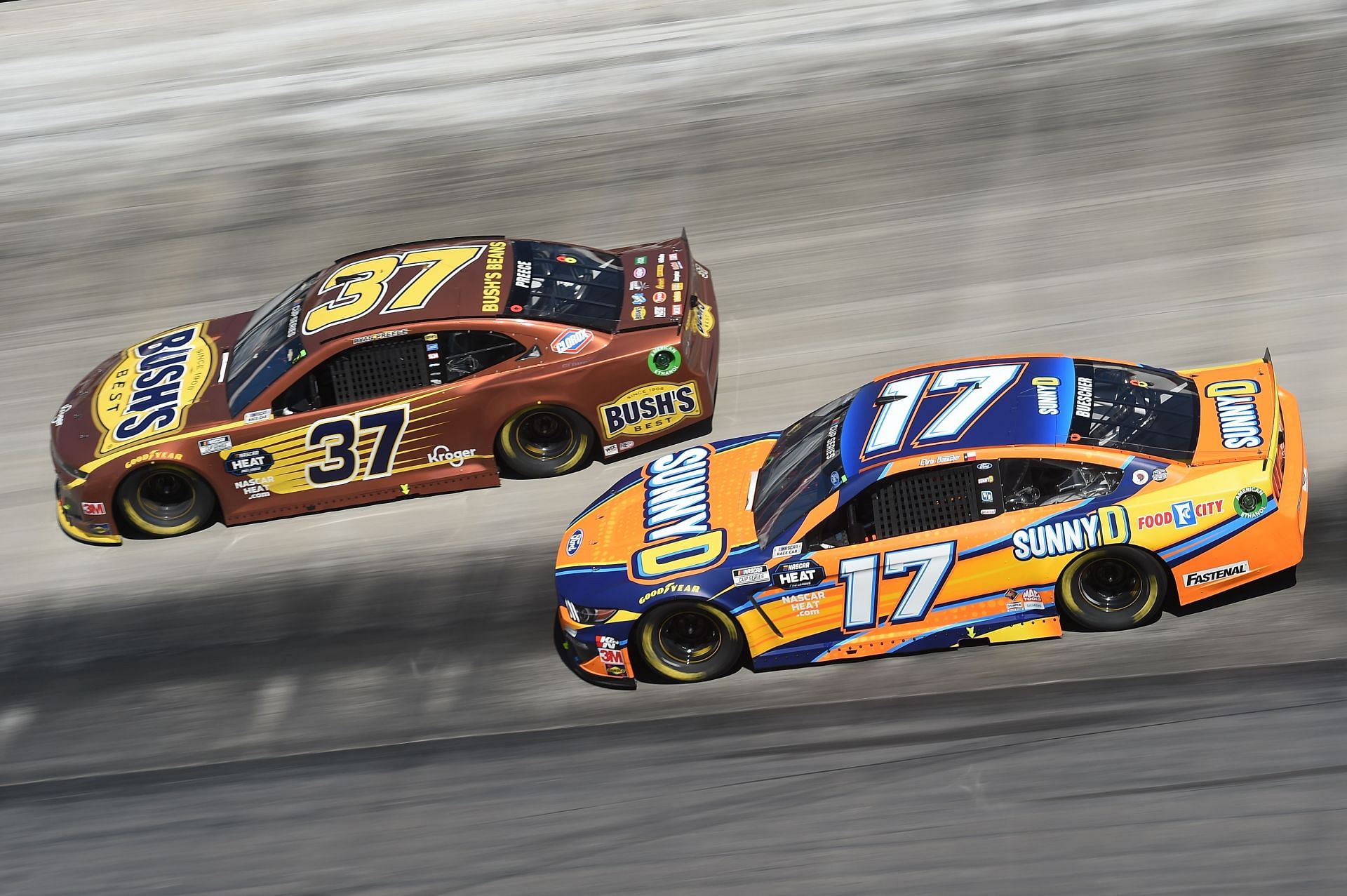 Ryan Preece, driver of the #37 Bush&#039;s Beans Chevrolet, leads Chris Buescher, driver of the #17 SunnyD Ford, during a NASCAR Cup Series race - Source: Getty Images