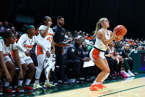 Haley Cavinder (#14) of the Miami Hurricanes shoots the ball against the Jacksonville Dolphins during the second half of their NCAA game at Watsco Center. Photo: Getty