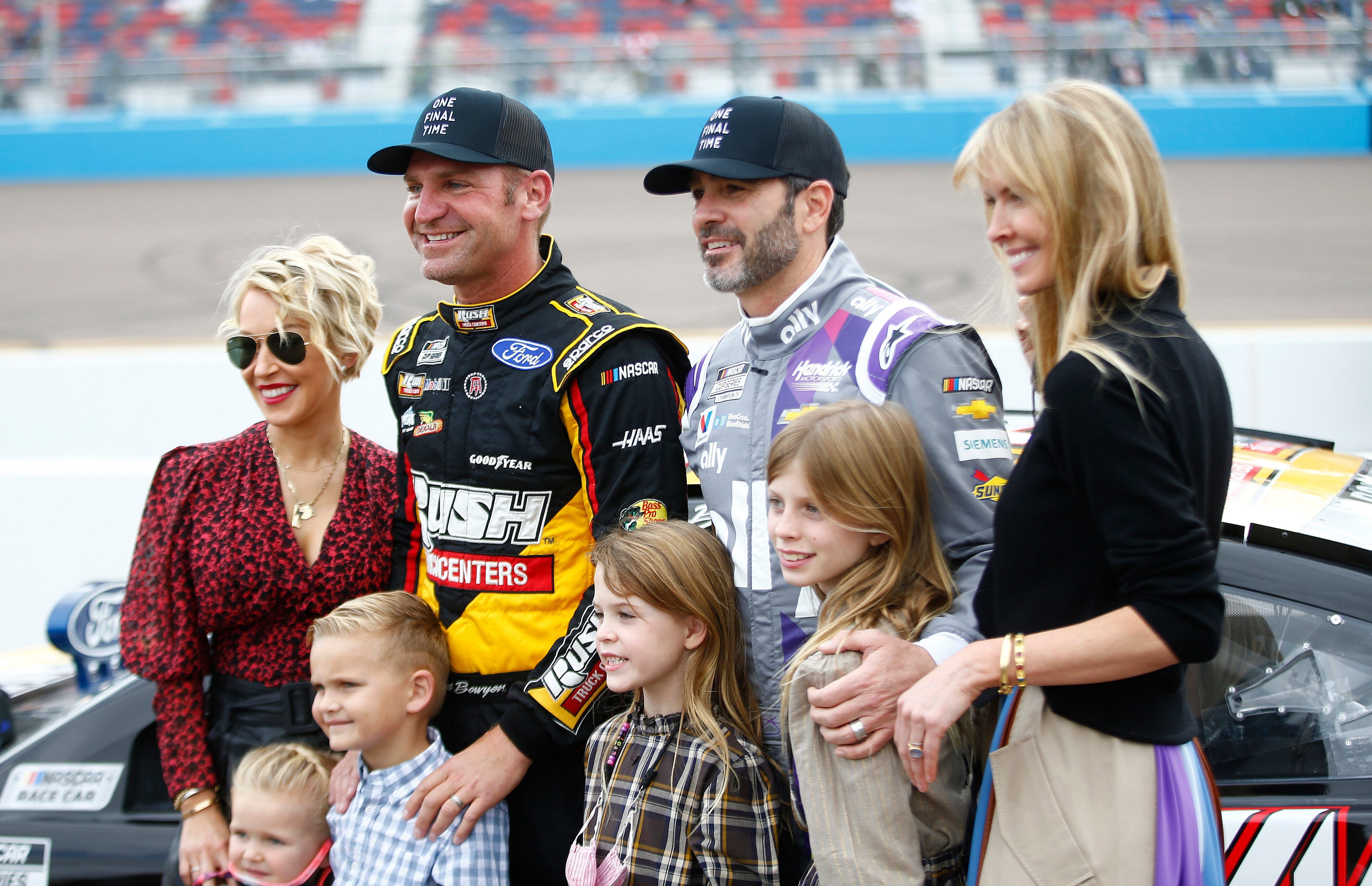 Clint Bowyer and his family take a picture with Jimmie Johnson (R) and his family - Source: Imagn