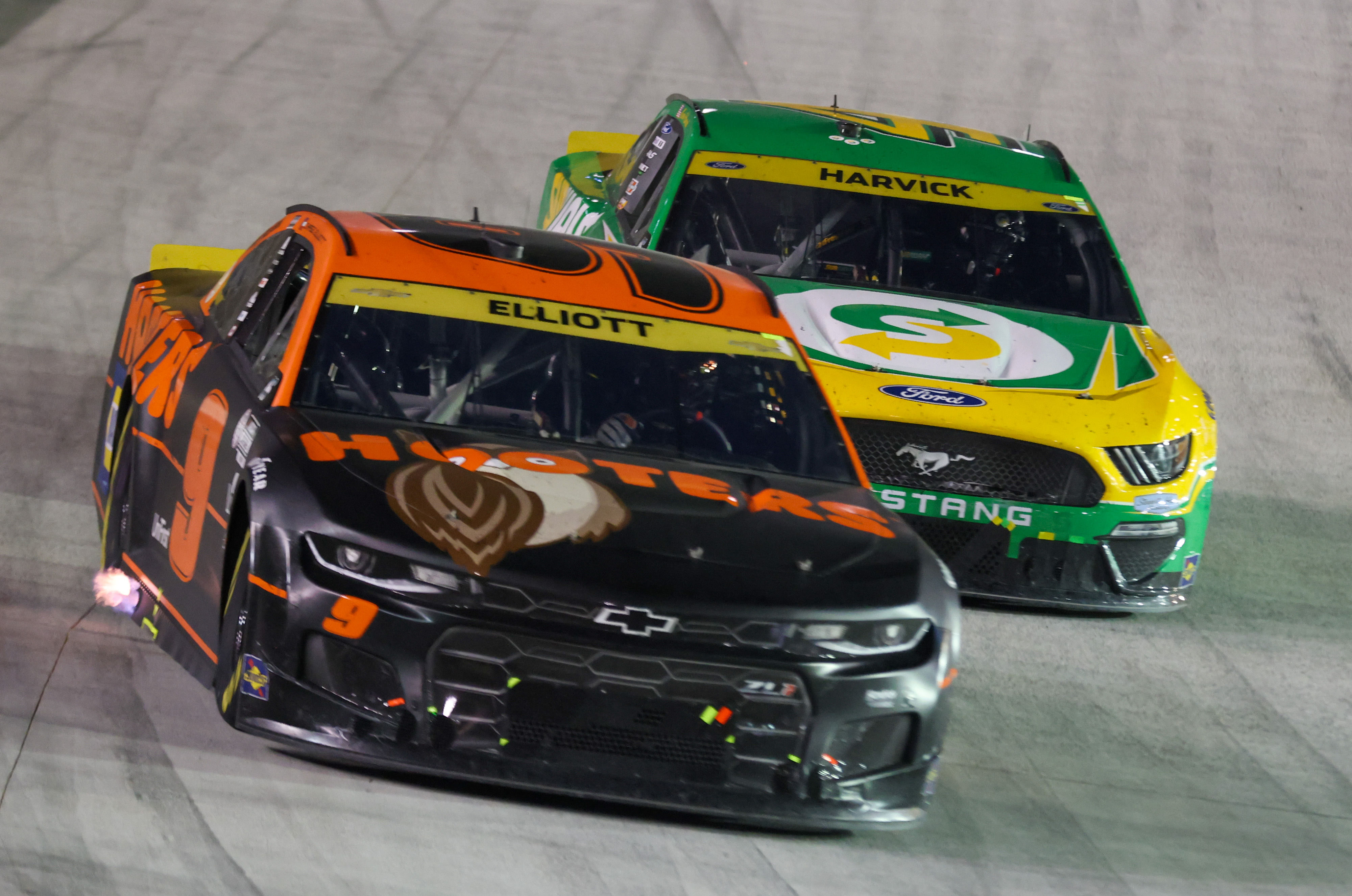  Chase Elliott (9) and driver Kevin Harvick (4) compete during the race at Bristol Motor Speedway.  - Source: Imagn