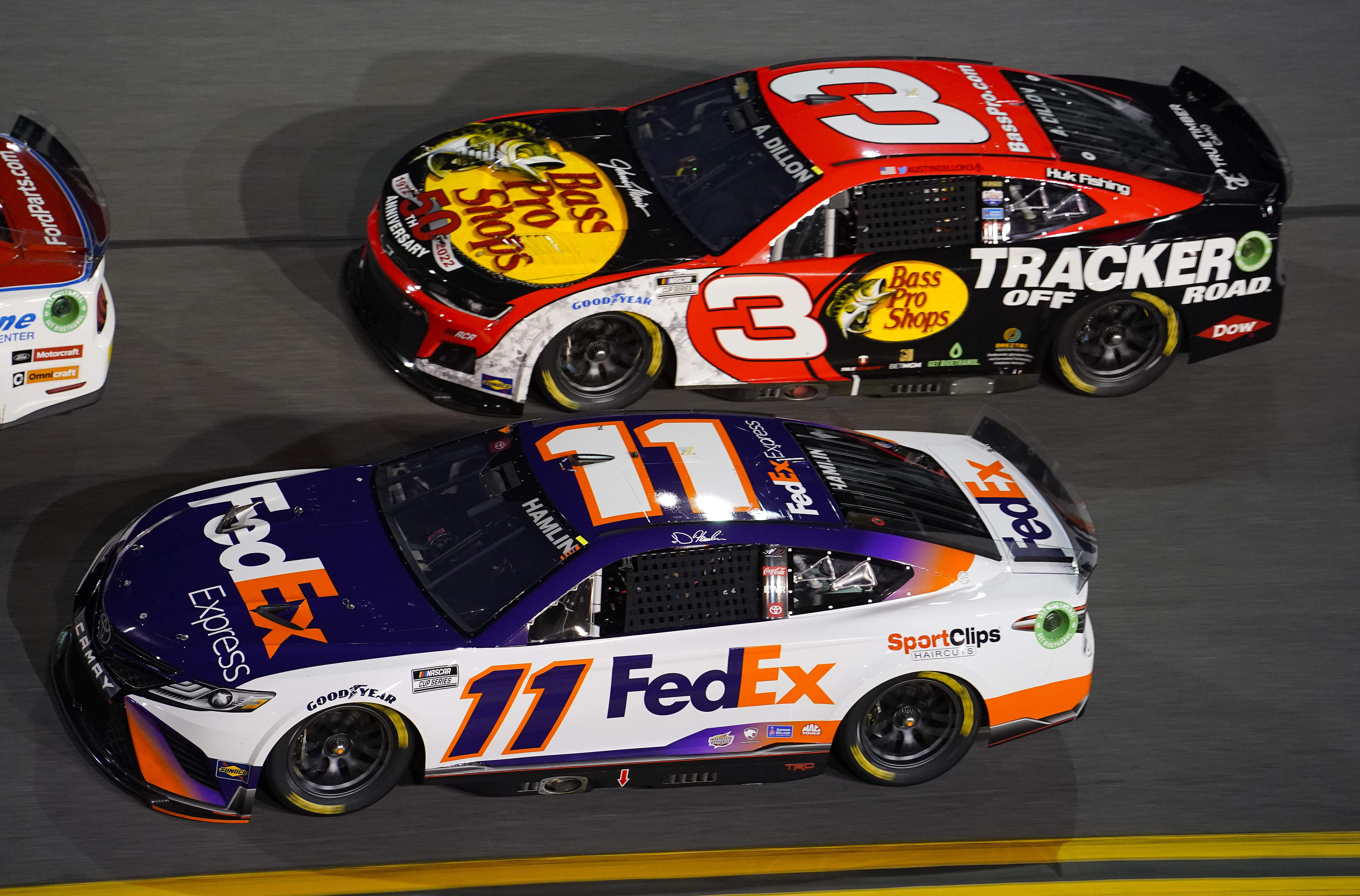 Austin Dillon driving the No.3 Chevrolet and Denny Hamlin driving the No. 11 Toyota. - Source: Imagn