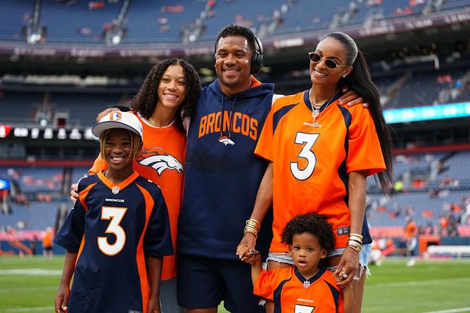 Russell Wilson and Ciara send festive message in family Christmas shoot