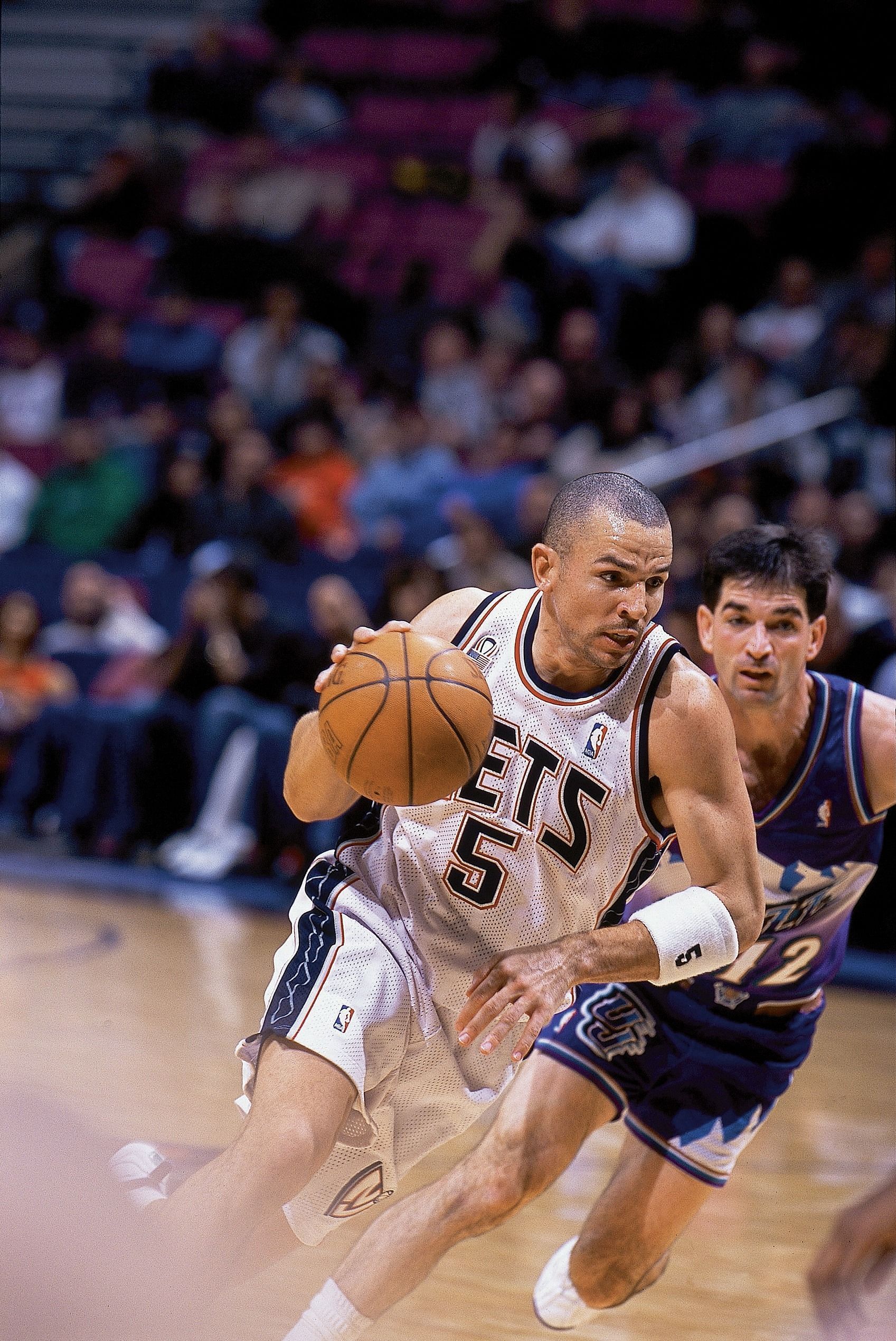 New Jersey Nets Jason Kidd (5) in action vs Utah Jazz&#039;s John Stockton (12), East Rutherford, NJ 12/22/2001 Source: Getty