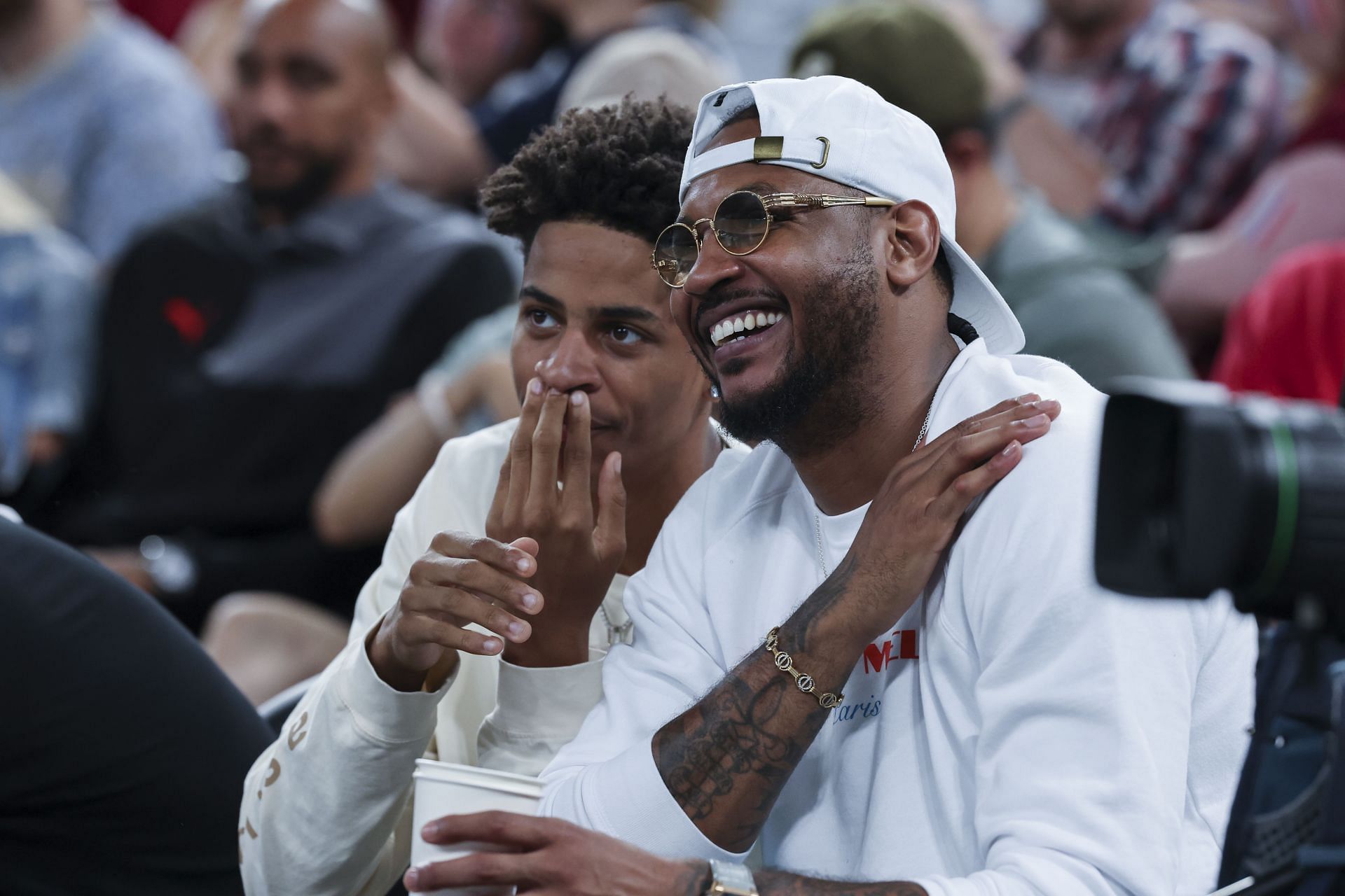 Carmelo Anthony and his son Kiyan Anthony attend the Men's Semifinal match between Team France and Team Germany on Day 13 of the 2024 Paris Olympics at Bercy Arena on August 8, 2024. Photo: Getty