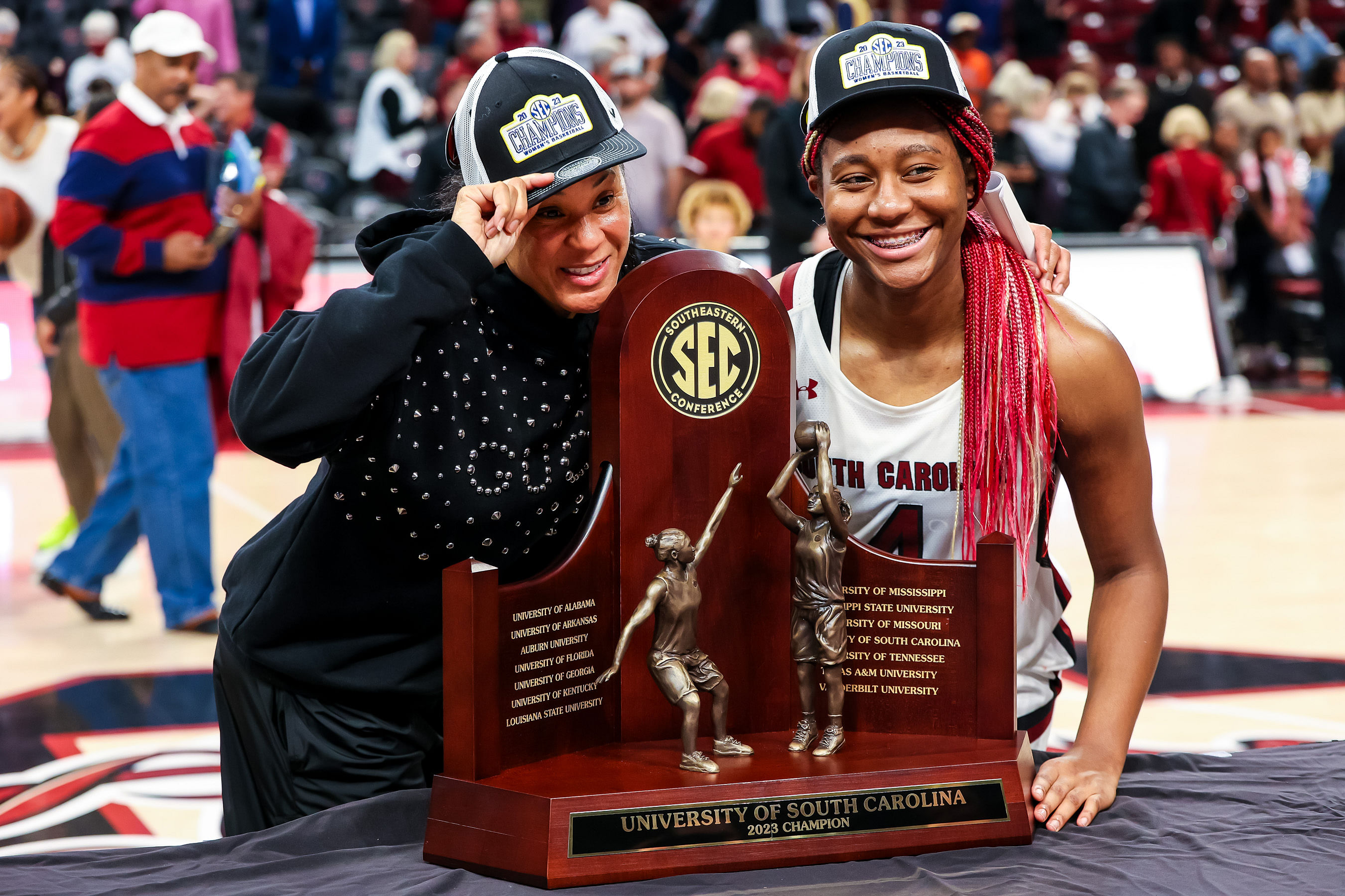 Dawn Staley and Aliyah Boston with the 2023 SEC Championship. Source: Jeff Blake, Imagn