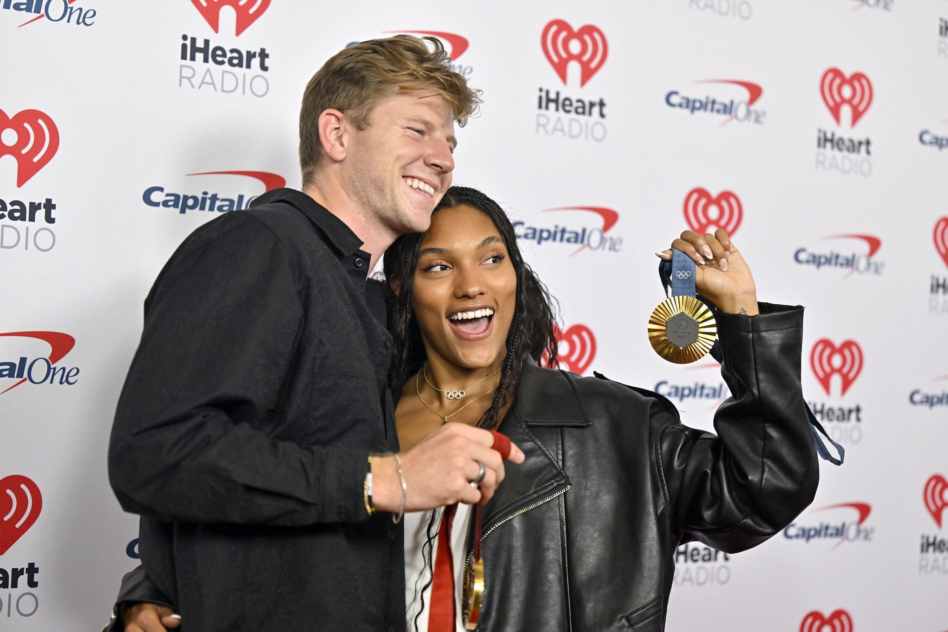 Tara Davis-Woodhall and Hunter Woodhall at the 2024 iHeartRadio Music Festival - (Source: Getty)