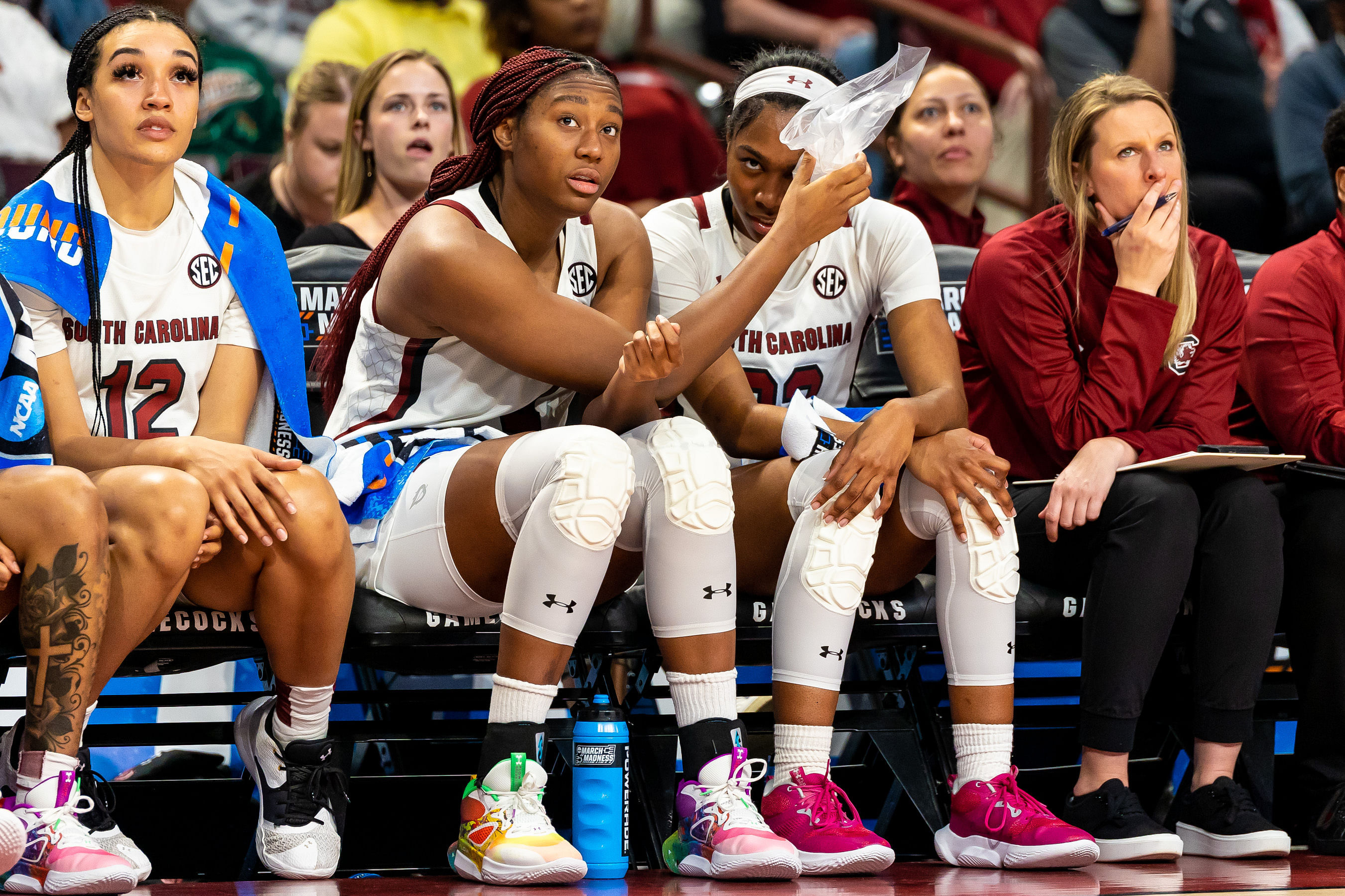 South Carolina Gamecocks forward Aliyah Boston (#4) holds an ice pack for guard Bree Hall (#23) in the second half against the Norfolk State Spartans. Photo: Imagn