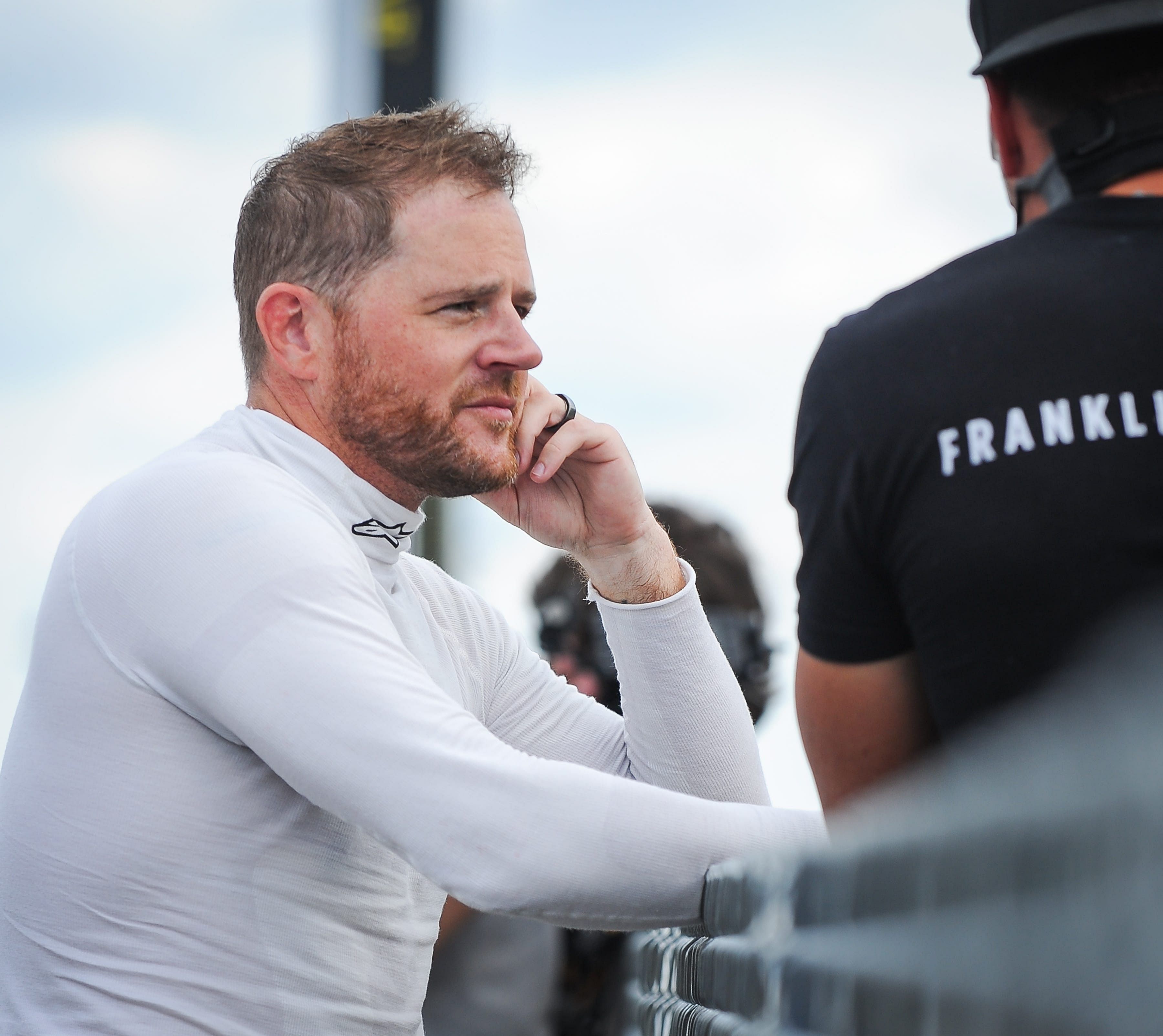 Justin Marks talks with a crew member after Trans Am practice - Source: Imagn