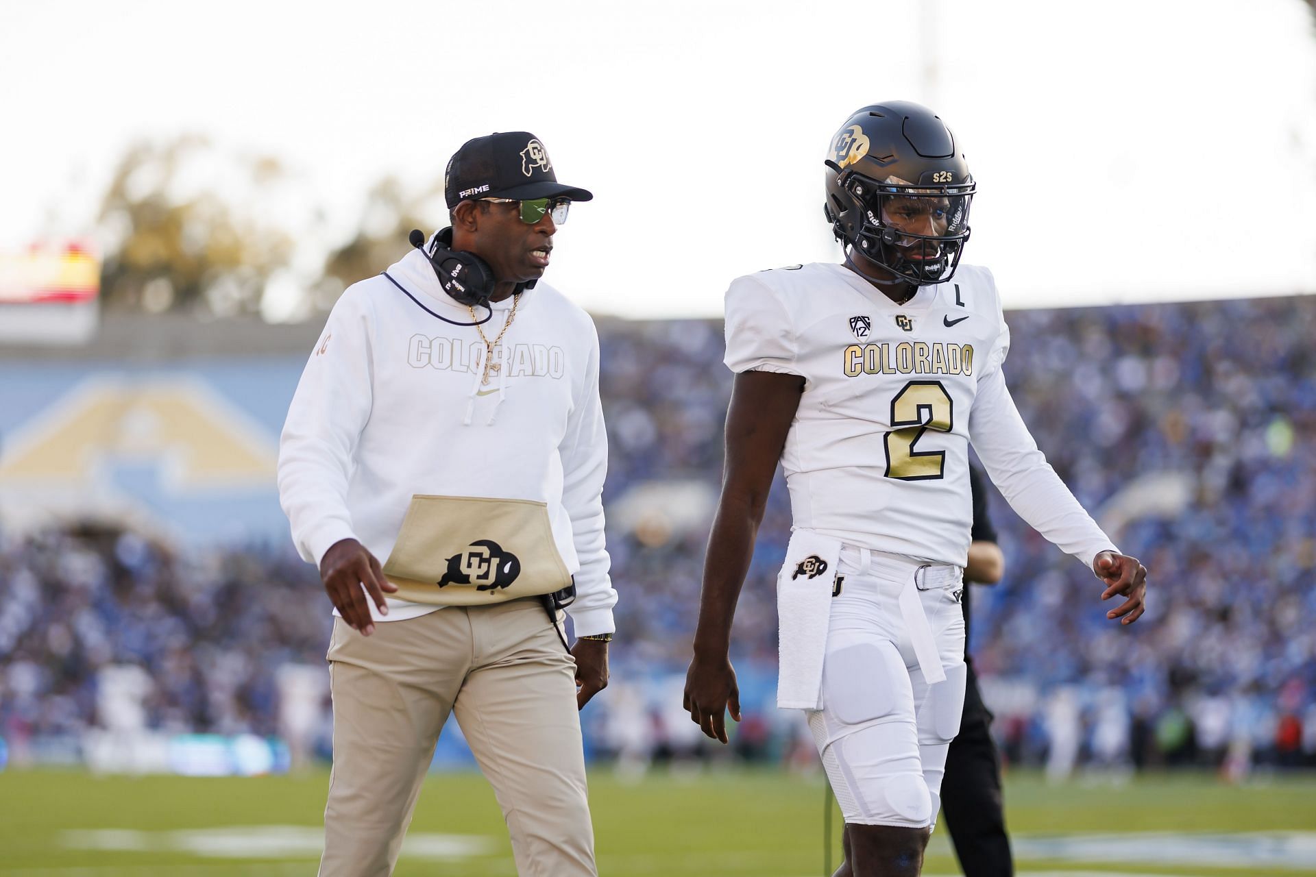 Deion Sanders and his son Shedeur Sanders at Colorado Buffaloes. (Credits: Getty)