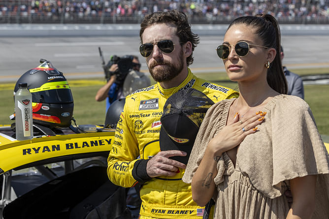 Ryan Blaney’s fiancée, Gianna, drops a sneaky wedding update as she showcases her opulent Valentino Garavani pumps