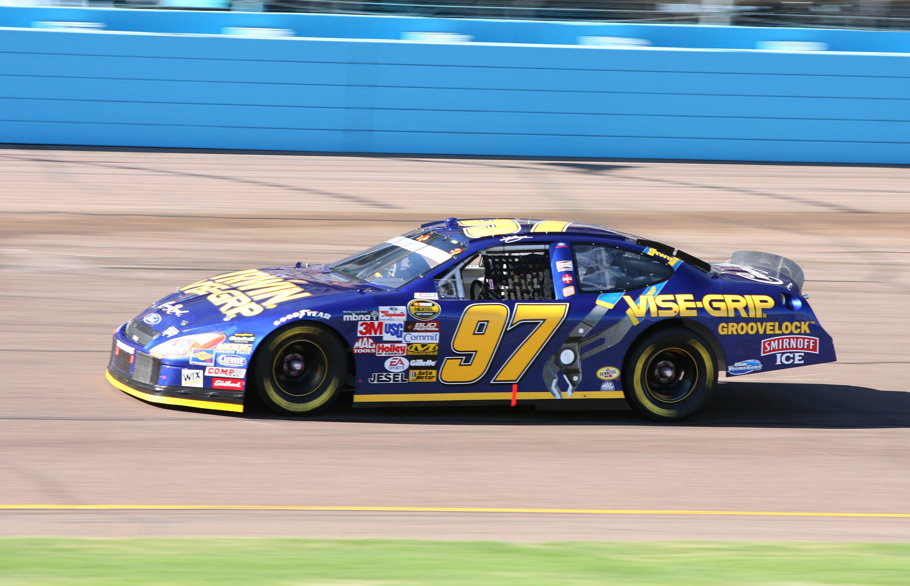 Nov 13, 2005; Phoenix, AZ, USA; Kurt Busch qualifies for the Checker Auto Parts 500 at Phoenix International Raceway, Mandatory Credit: Rick Scuteri-Imagn Images Copyright Rick Scuteri