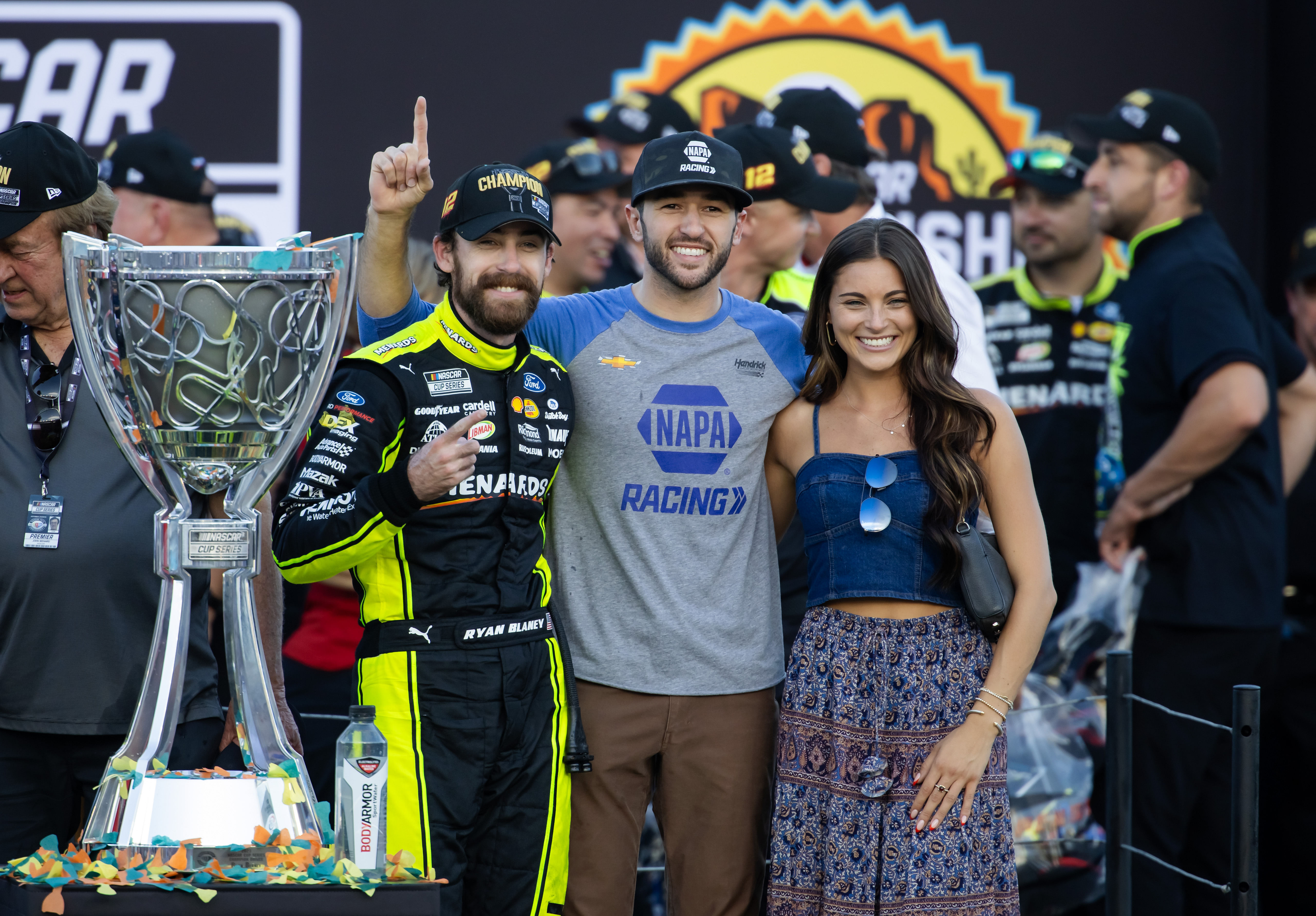 Ryan Blaney celebrating the 2023 championship with Chase Elliott and Gianna Tulio - Source: Imagn