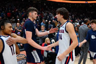 Connecticut Huskies center Donovan Clingan (#32) and Gonzaga Bulldogs forward Braden Huff (#34) shake hands after the game at Climate Pledge Arena. Photo: Imagn