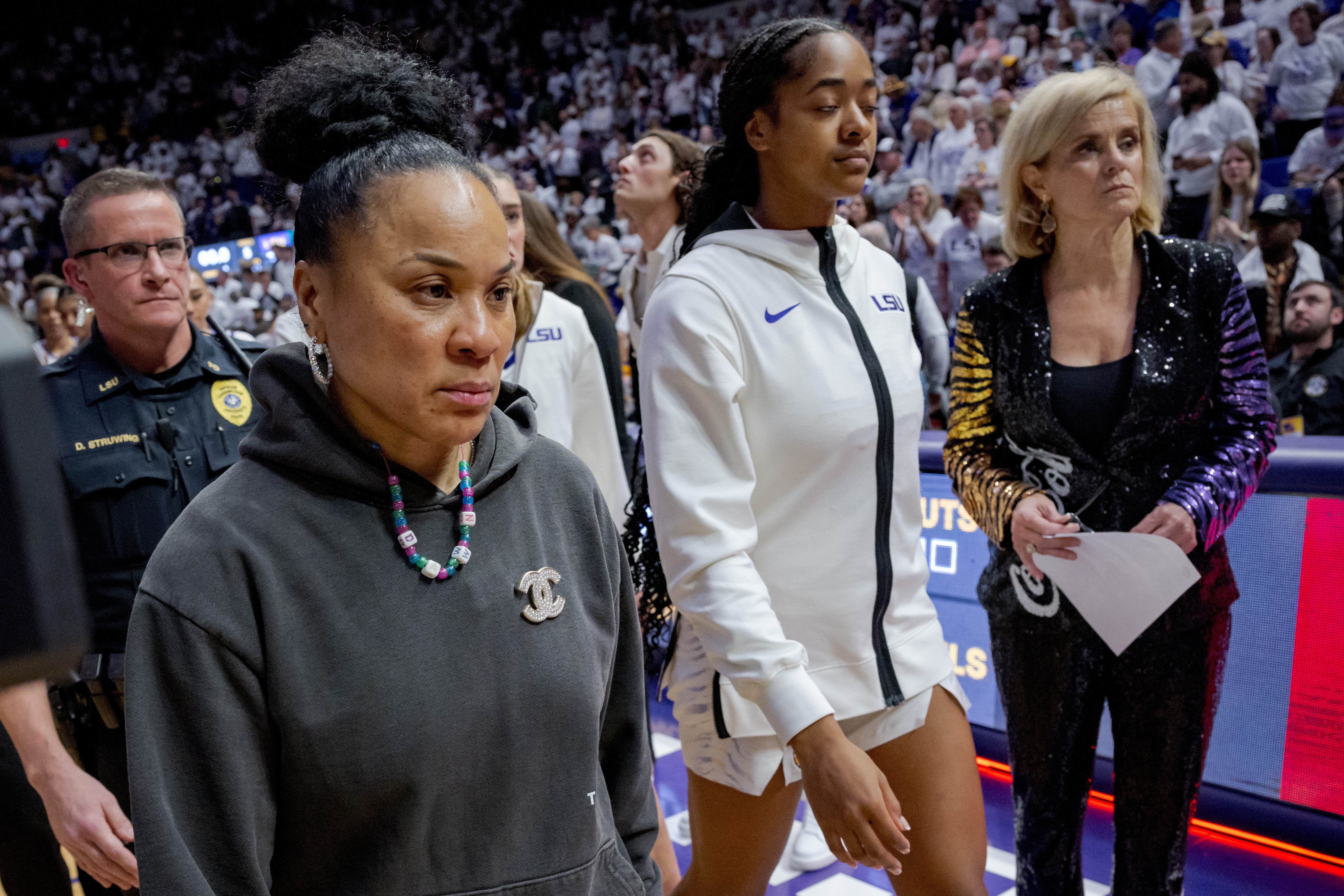 Dawn Staley (left-center) and Kim Mulkey (right) [NCAA Womens Basketball: South Carolina at Louisiana State - Source: Imagn]