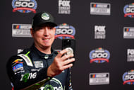 Cup Series driver Kyle Busch does a social media post during media day at Daytona International Speedway. - Source: Imagn
