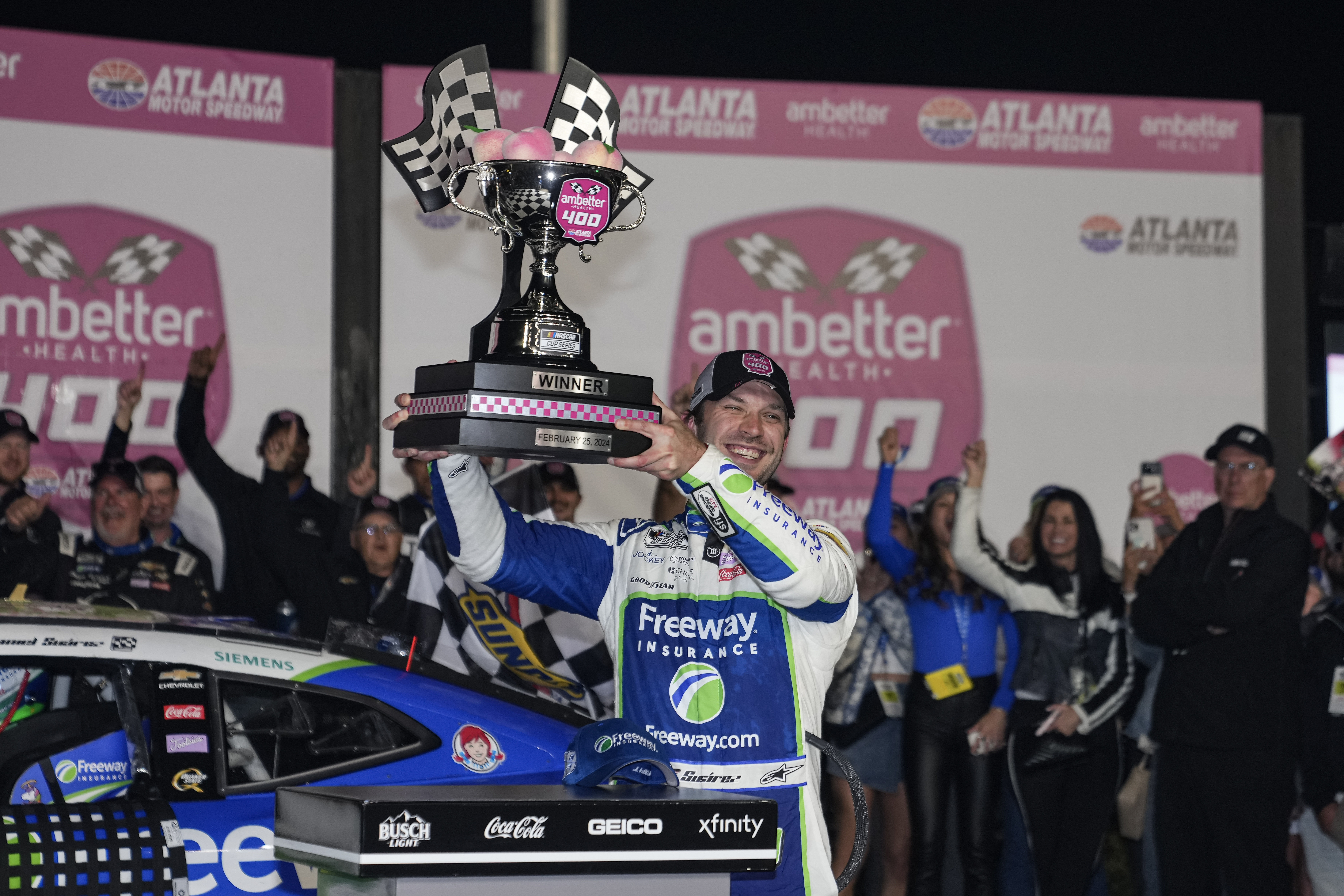 Daniel Suarez celebrates in Victory Lane after winning the Ambetter Health 400 at Atlanta Motor Speedway. - Source: Imagn