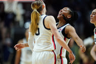 UConn Huskies guard Paige Bueckers (#5) reacts with guard KK Arnold (2) after her three-point basket against the Marquette Golden Eagles in the second half at Mohegan Sun Arena. Photo: Imagn