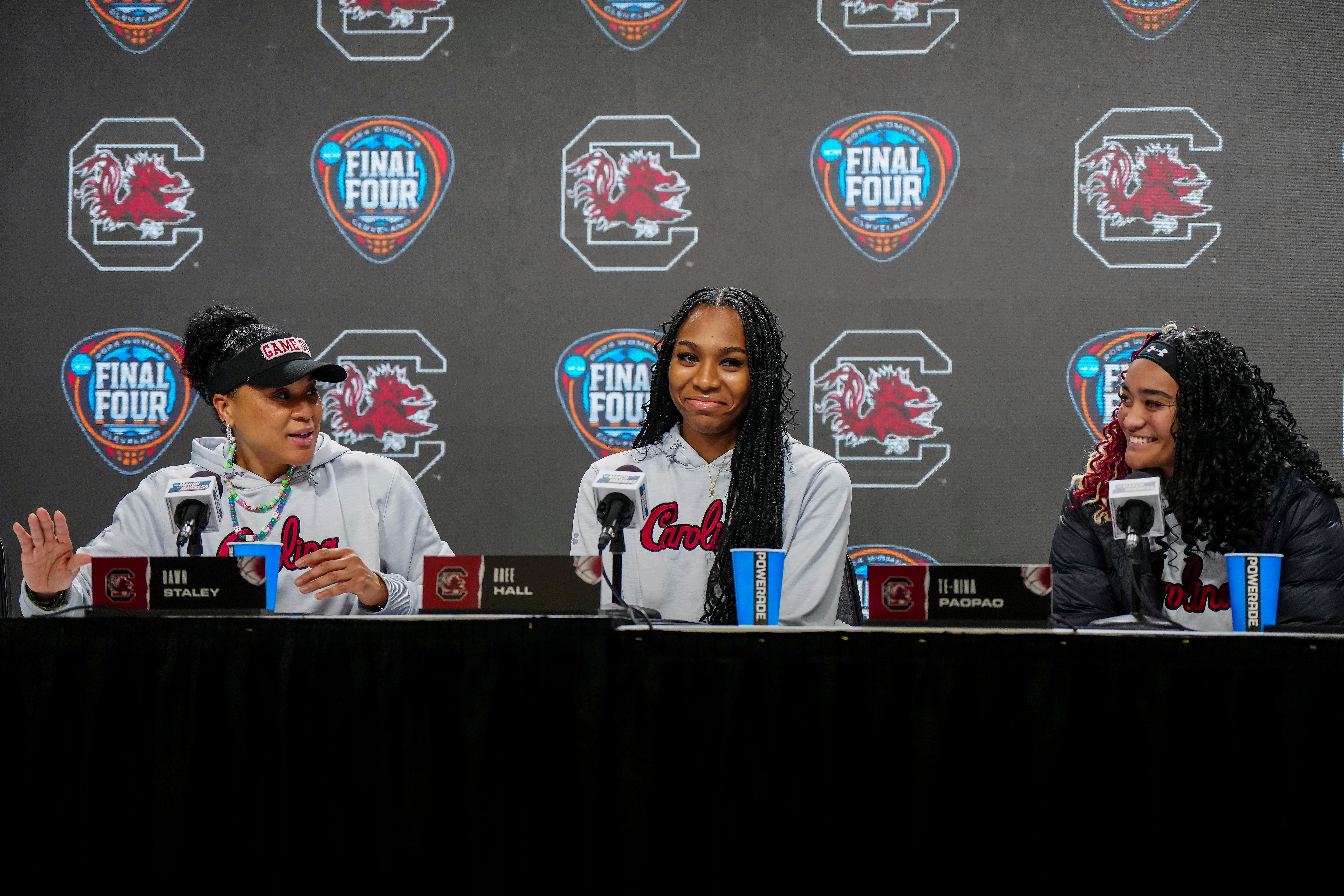 South Carolina Gamecocks coach Dawn Staley (left), guards Bree Hall (center) and Te-Hina Paopao during a press conference at Rocket Mortgage FieldHouse. Photo: Imagn