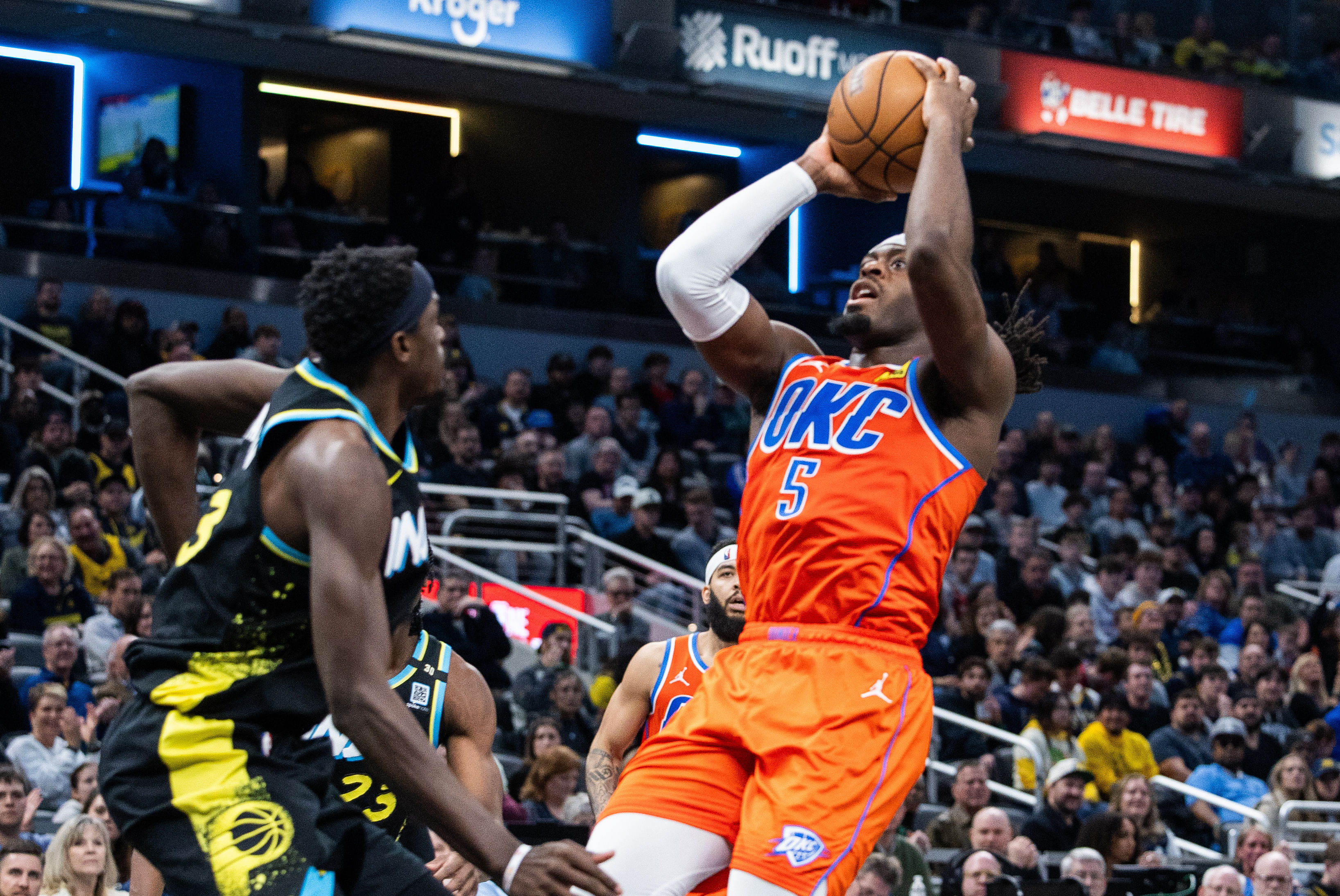 Oklahoma City Thunder guard Luguentz Dort (5) shoots the ball while Indiana Pacers forward Pascal Siakam (43) defends during the team&rsquo;s latest matchup. (Credits: IMAGN)