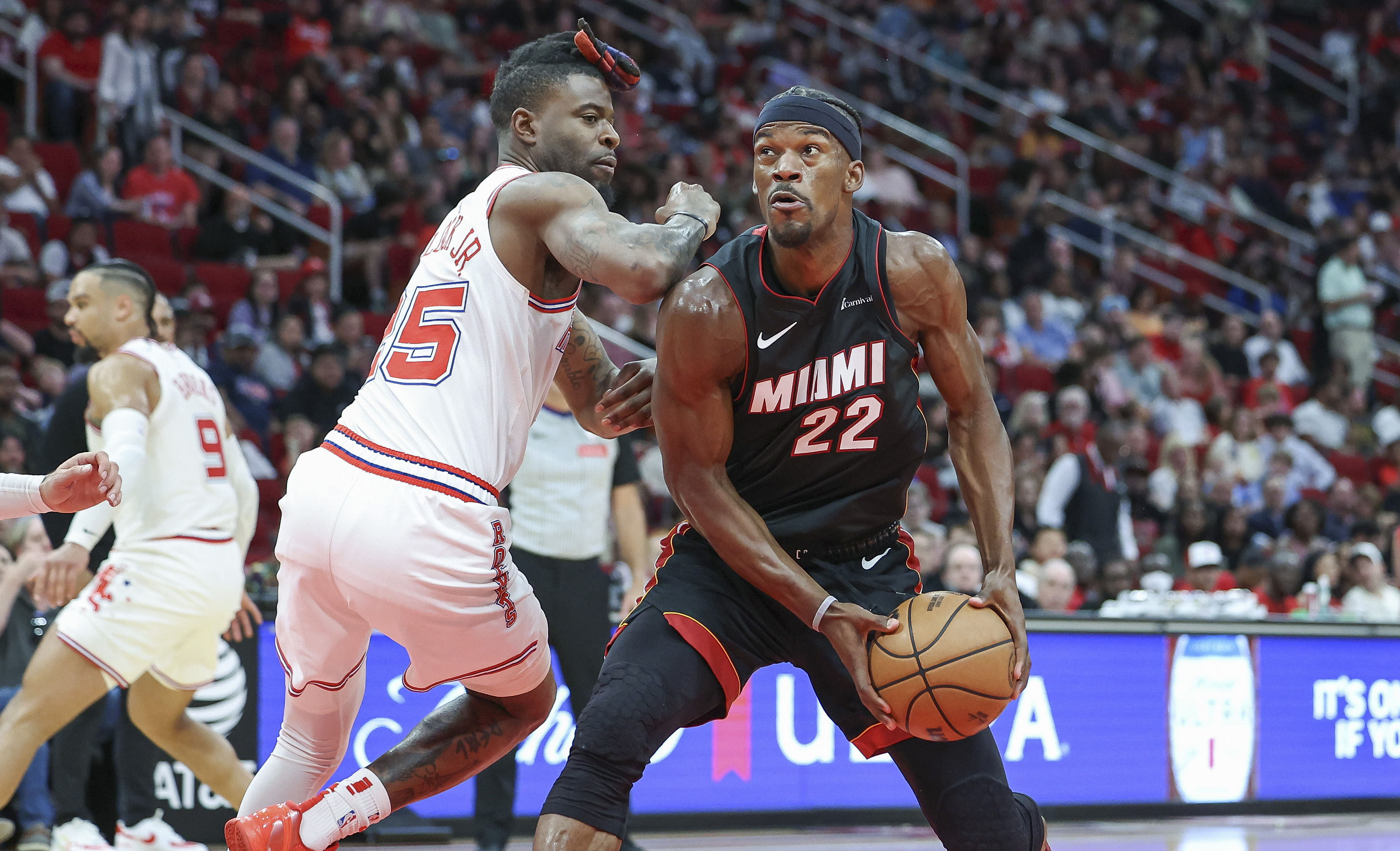 Miami Heat forward Jimmy Butler (22) drives towards the basket as Houston Rockets forward Reggie Bullock Jr. (25) defends - Source: Imagn