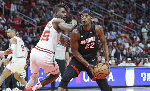 Miami Heat forward Jimmy Butler (22) drives towards the basket as Houston Rockets forward Reggie Bullock Jr. (25) defends - Source: Imagn