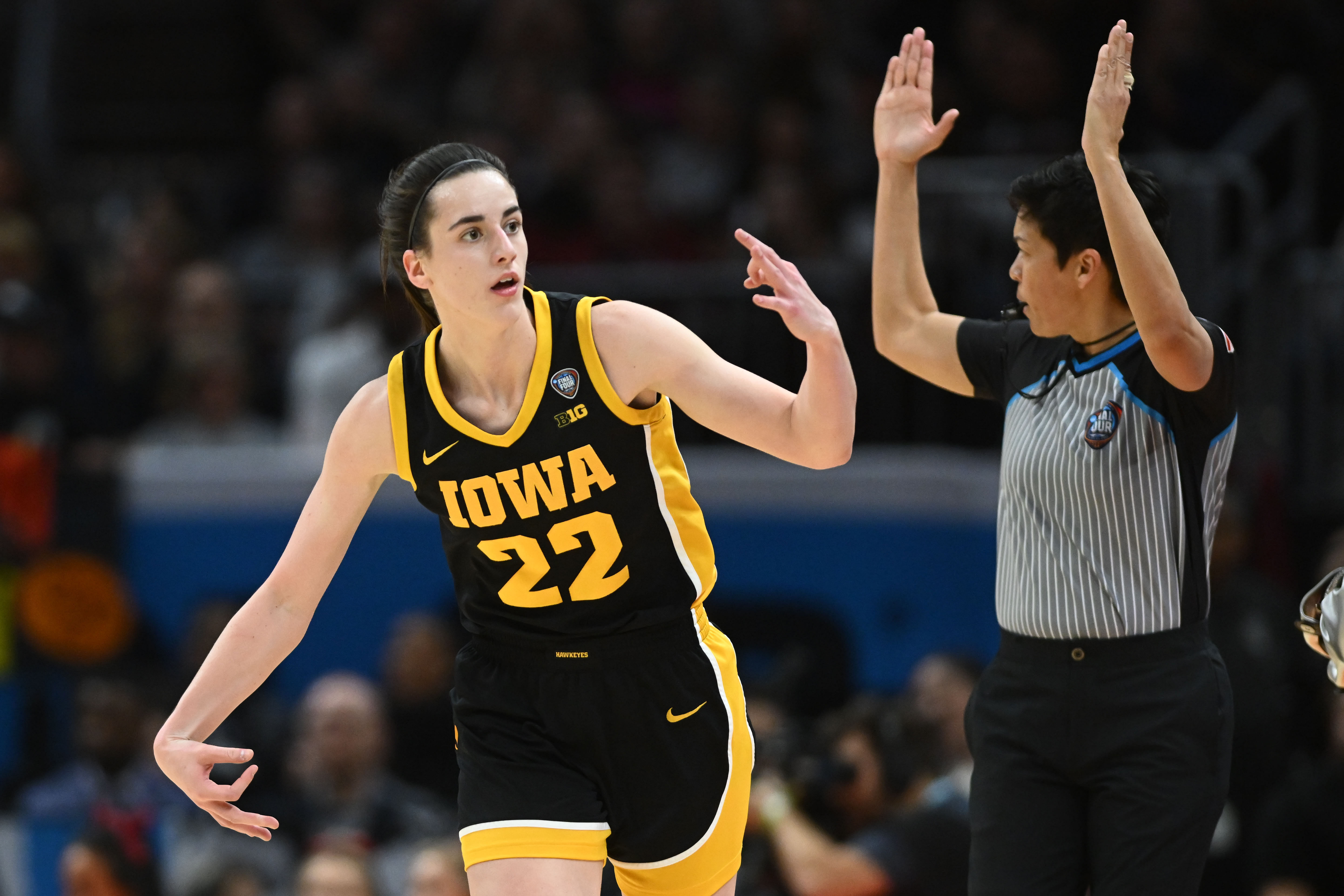 Iowa Hawkeyes guard Caitlin Clark reacts after making a 3-point basket against the South Carolina Gamecocks at Rocket Mortgage FieldHouse. Photo Credit: Imagn