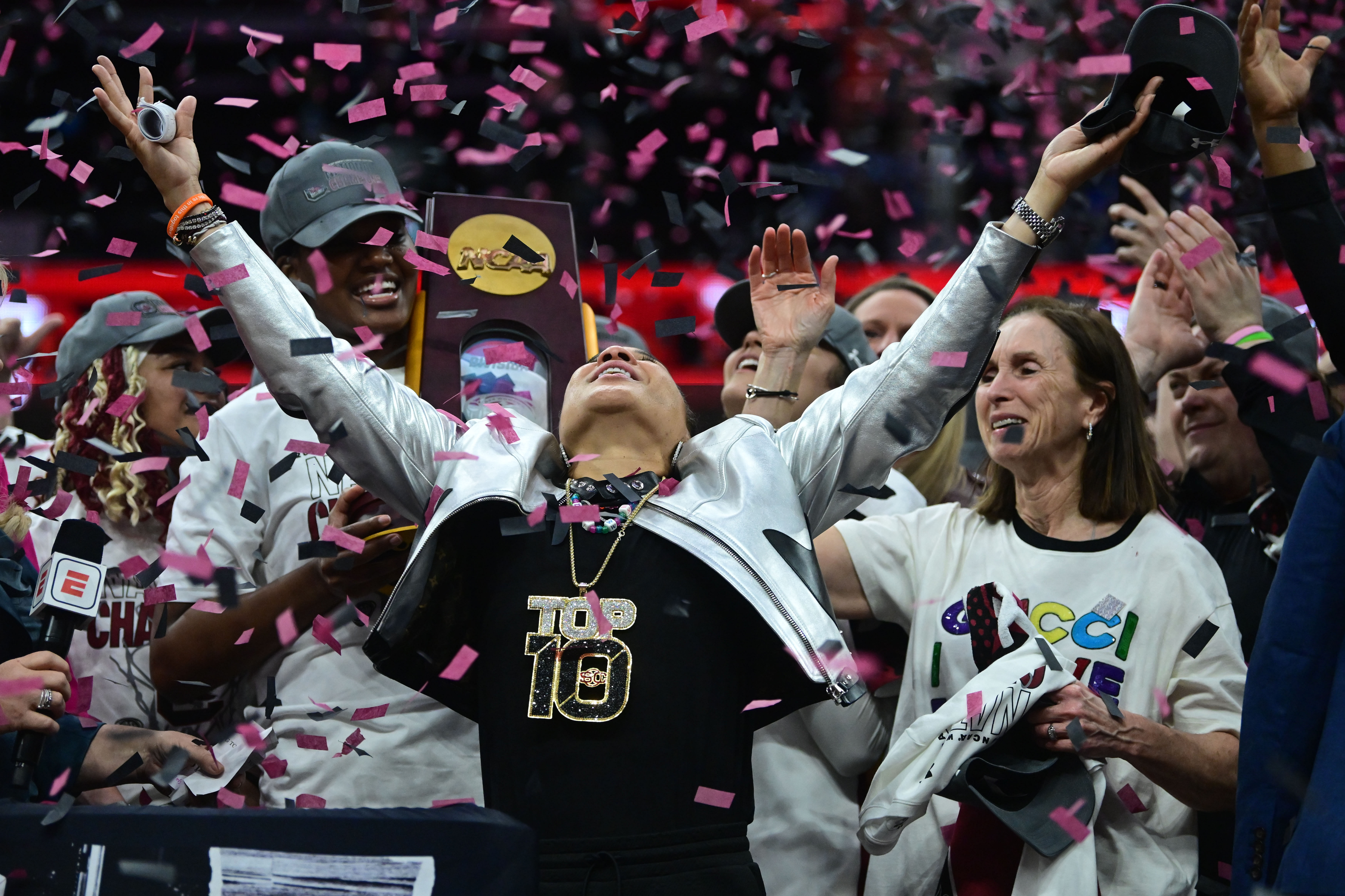 Staley celebrates at the trophy presentation during the 2024 Final Four National Championship. (Image via Imagn)