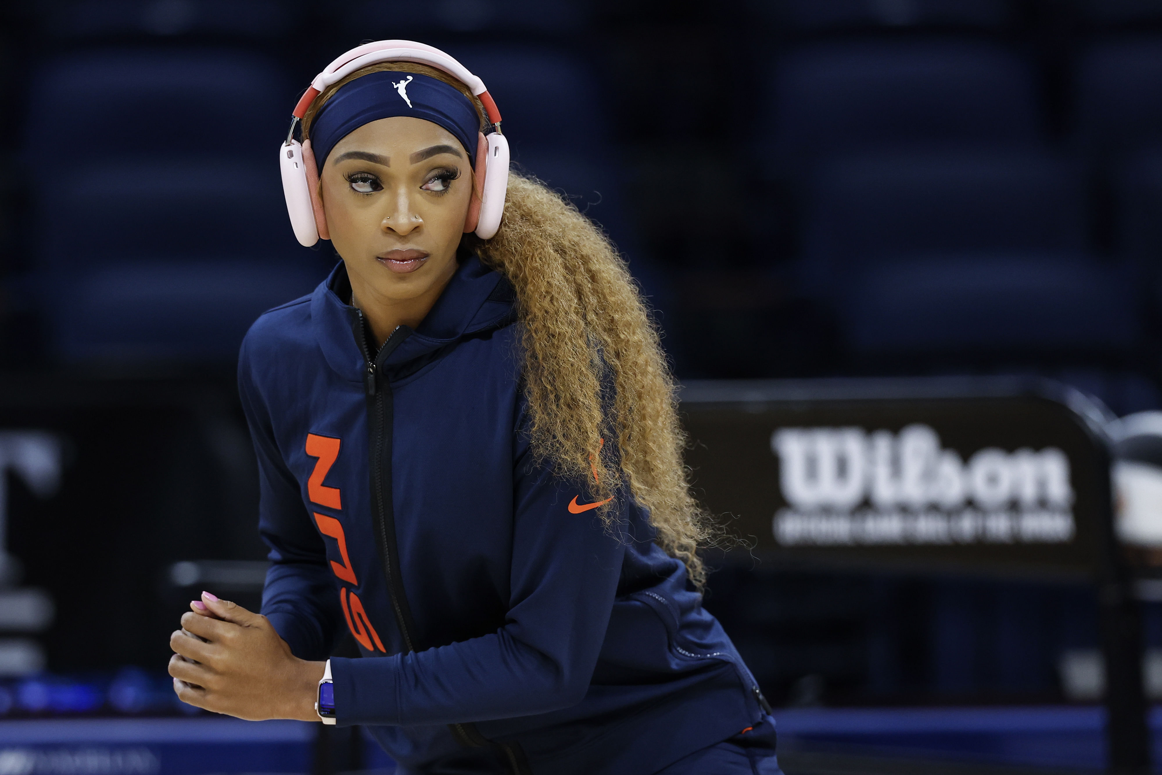 Connecticut Sun guard DiJonai Carrington warms up before a basketball game against the Chicago Sky at Wintrust Arena. (Credits: IMAGN)