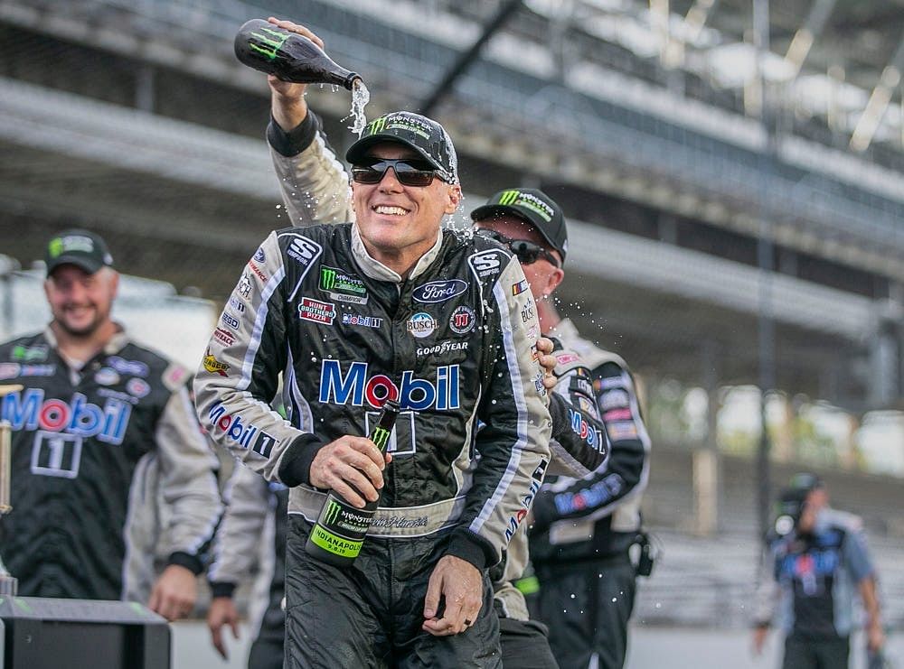 Kevin Harvick gets drenched in champagne after winning the 2019 Big Machine Vodka 400 at the Brickyard at Indianapolis Motor Speedway - Source: Imagn