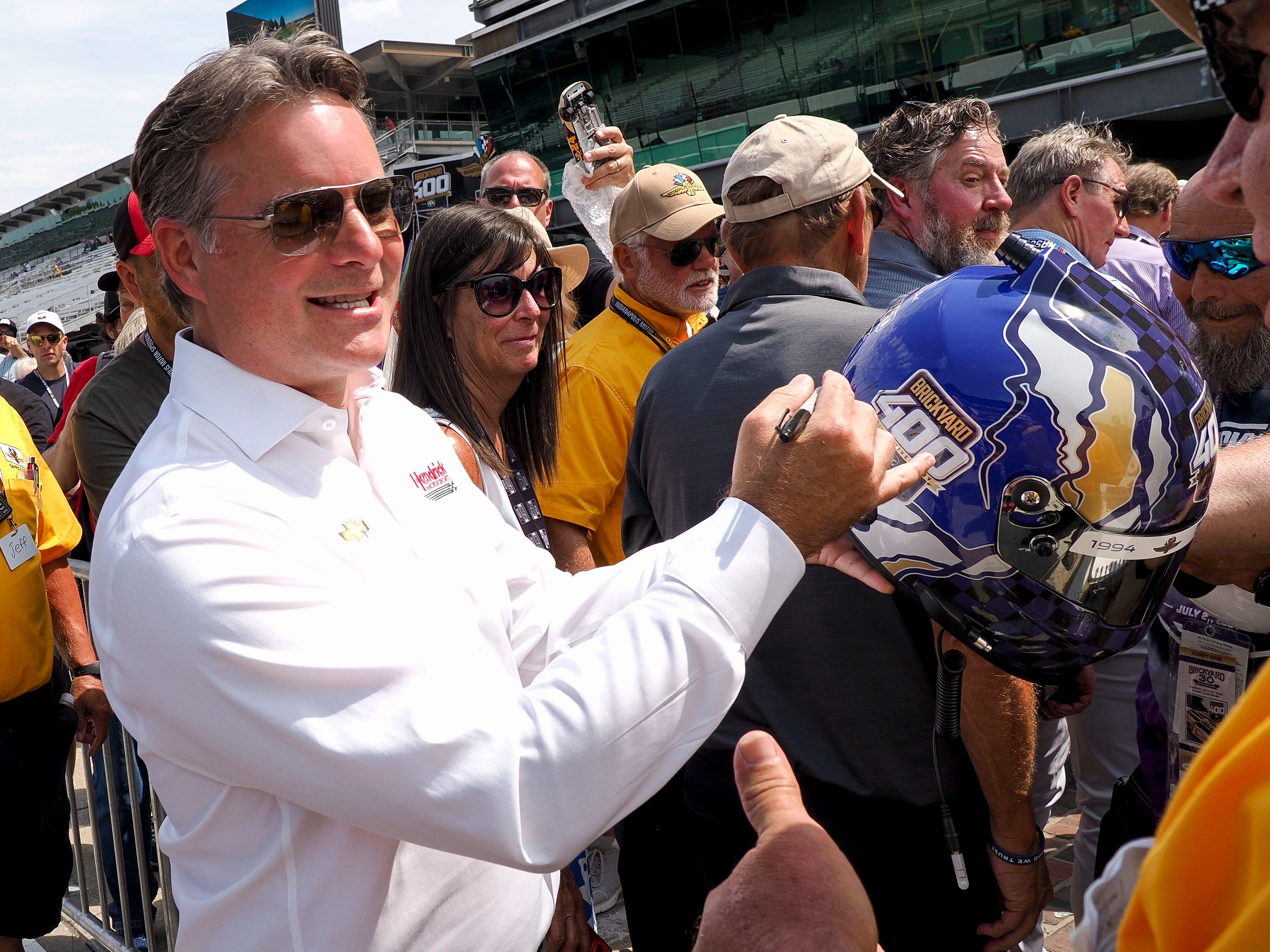 Jeff Gordon signs autographs ahead of the Brickyard 400 - Source: Imagn