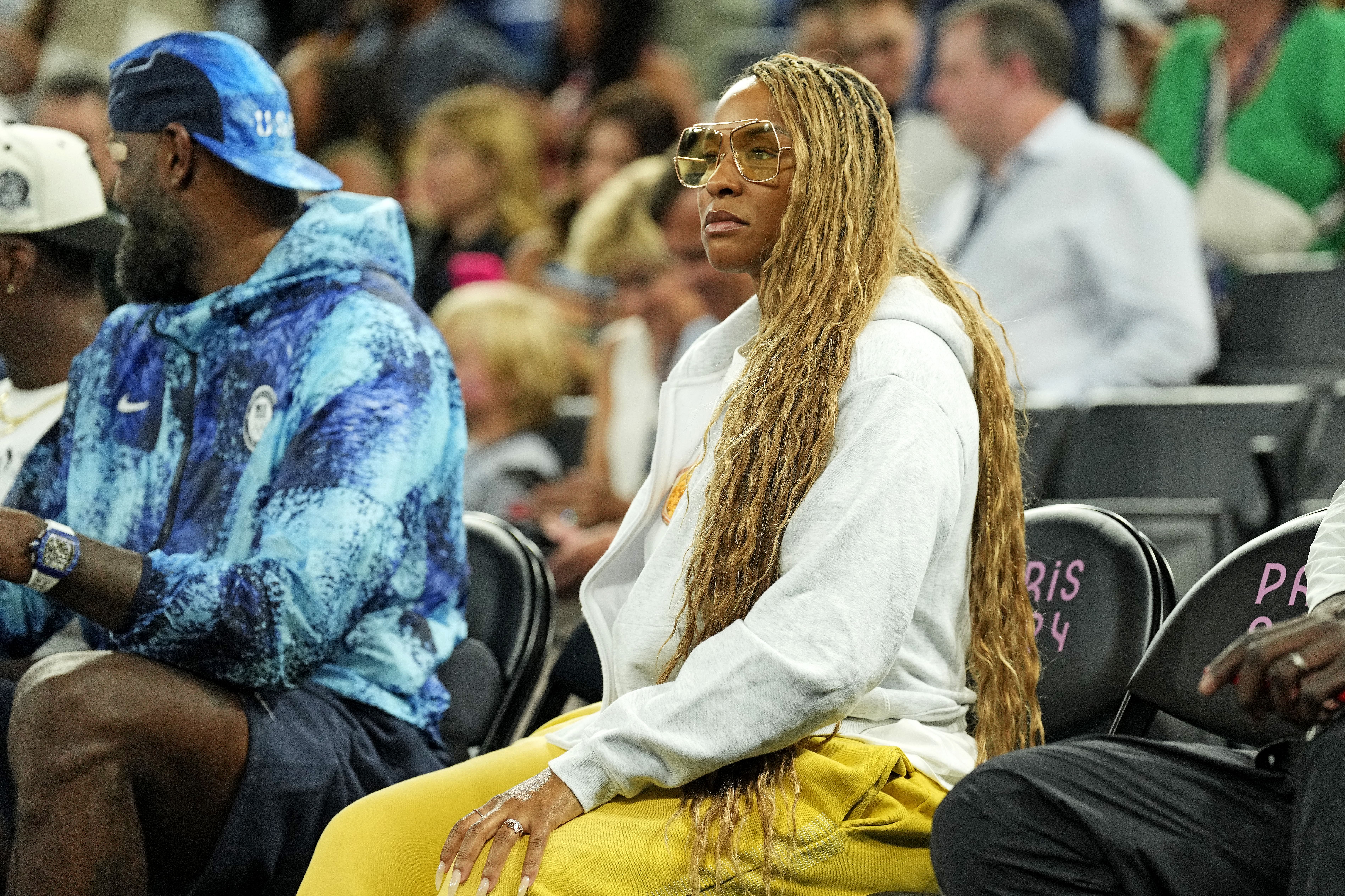 Aug 7, 2024; Paris, France; Savannah James, wife of Lebron James, sits court side before the game between the United States and Nigeria in the women&rsquo;s basketball quarterfinals during the Paris 2024 Olympic Summer Games at Accor Arena. Mandatory Credit: Kyle Terada-Imagn Images - Source: Imagn