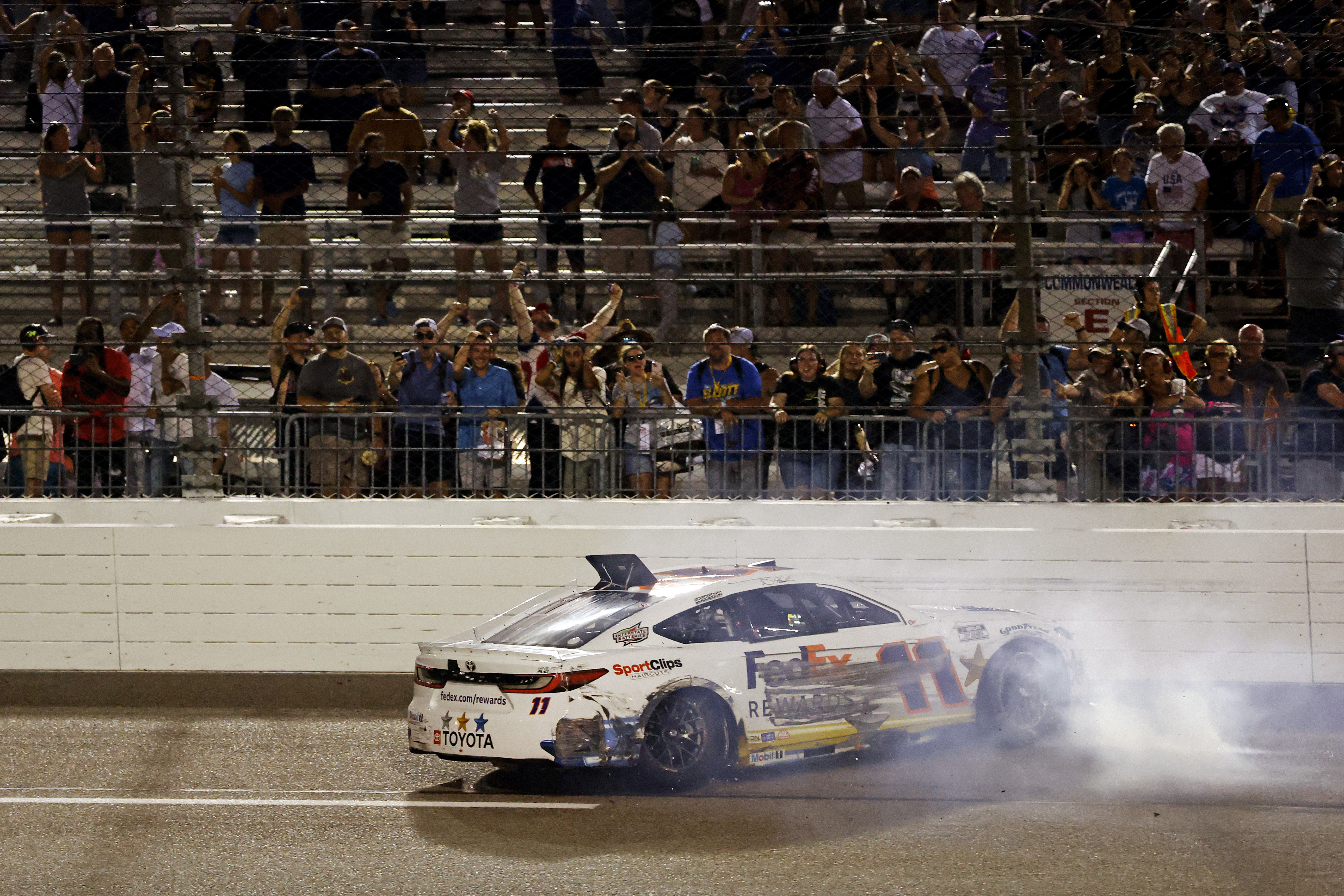 Denny Hamlin (11) wrecks after the finish of the race during the Cook Out 400 at Richmond Raceway - Source: Imagn