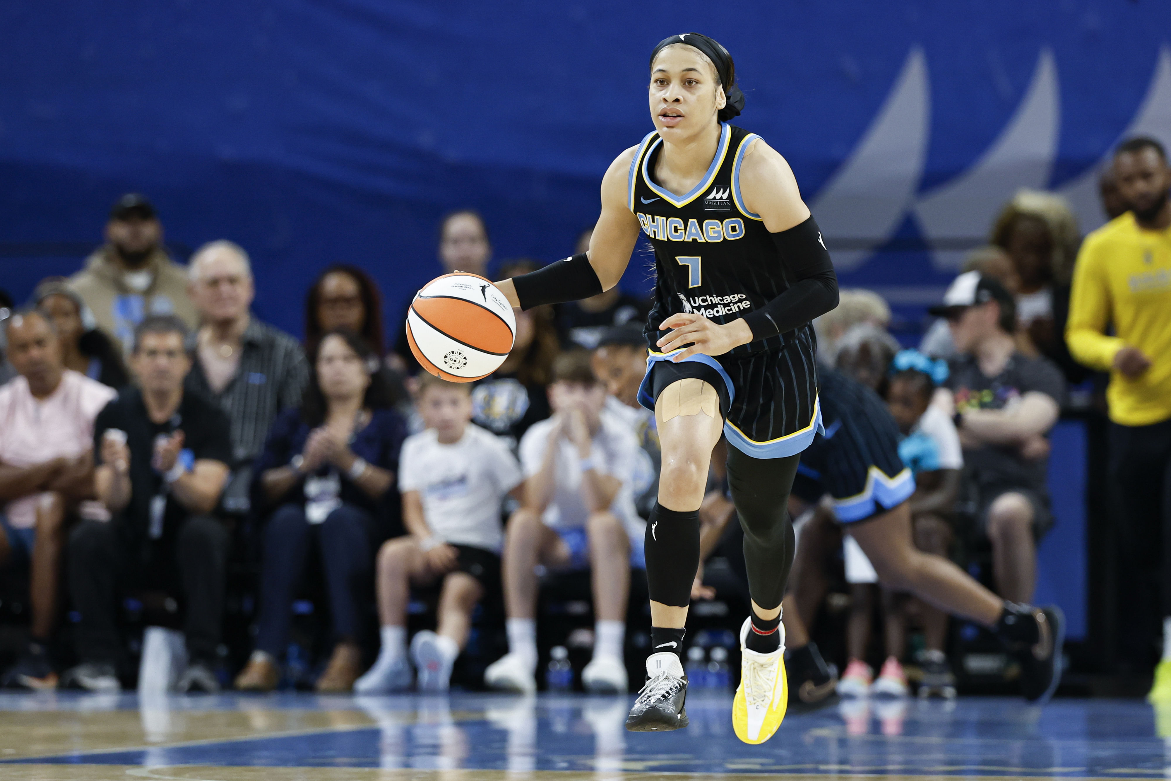 Aug 25, 2024; Chicago, Illinois, USA; Chicago Sky guard Chennedy Carter (7) brings the ball up court against the Las Vegas Aces during the first half at Wintrust Arena. Mandatory Credit: Kamil Krzaczynski-Imagn Images - Source: Imagn