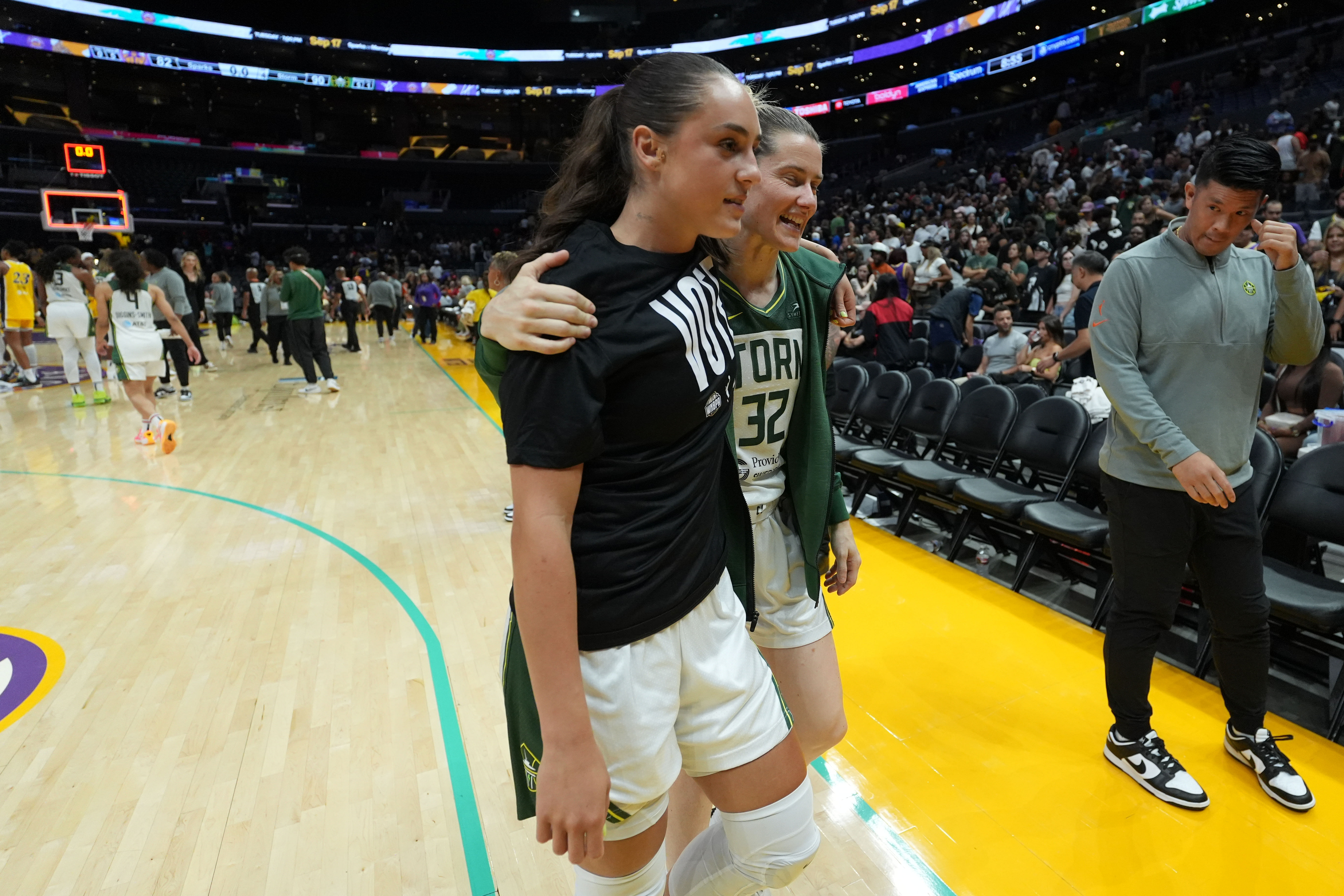 Sep 11, 2024; Los Angeles, California, USA; Seattle Storm guard Nika Muhl (left) and guard Sami Whitcomb (32) walk off the court after the game against the Seattle Storm at Crypto.com Arena. Mandatory Credit: Kirby Lee-Imagn Images - Source: Imagn