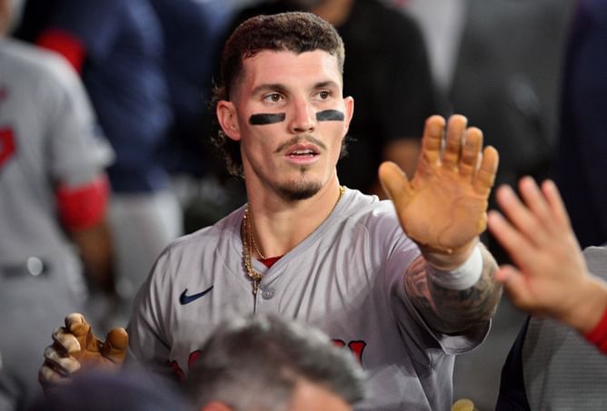 In Photos: Jarren Duran flexes 'Big Swole' persona as Red Sox star hits the gym in camouflage sleeveless tee