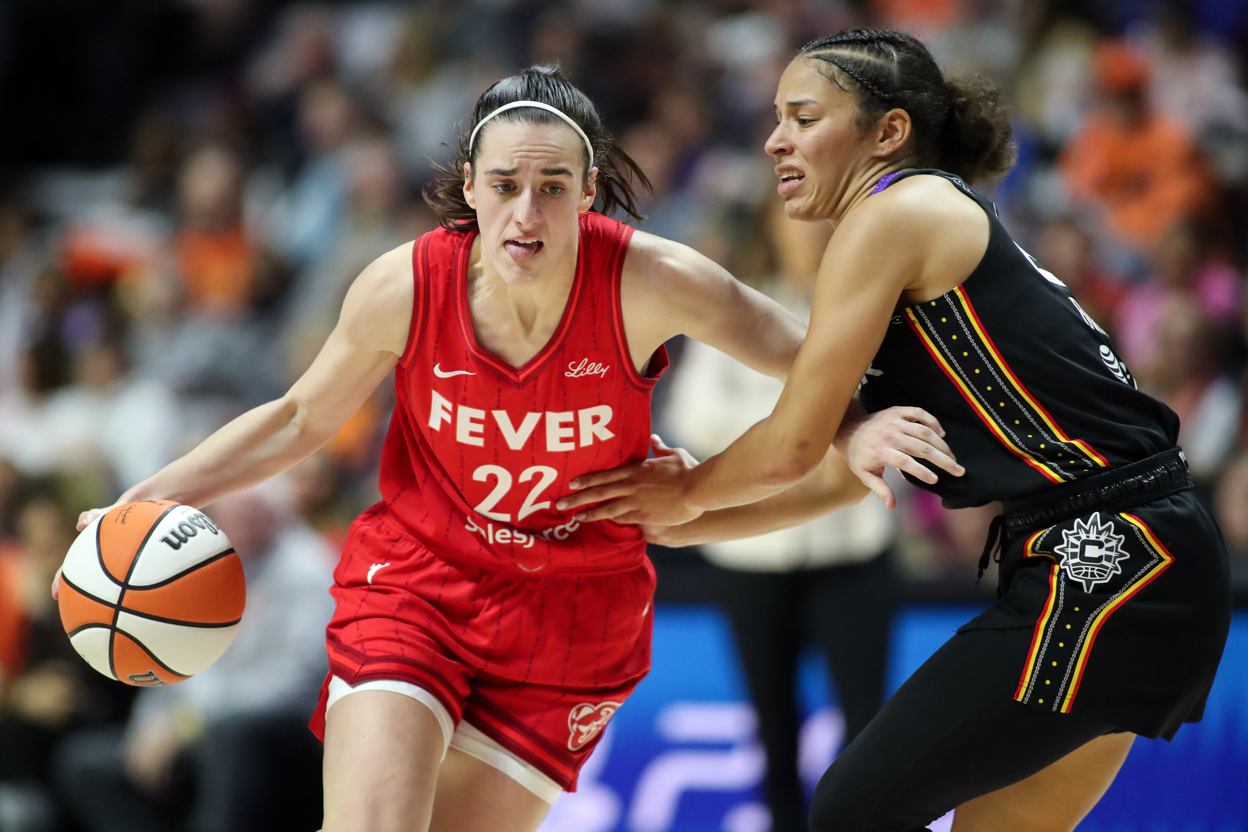 Indiana Fever guard Caitlin Clark (#22) dribbles the ball during the first half against the Connecticut Sun in Game Two of the first round of the 2024 WNBA Playoffs at Mohegan Sun Arena. Photo: Imagn