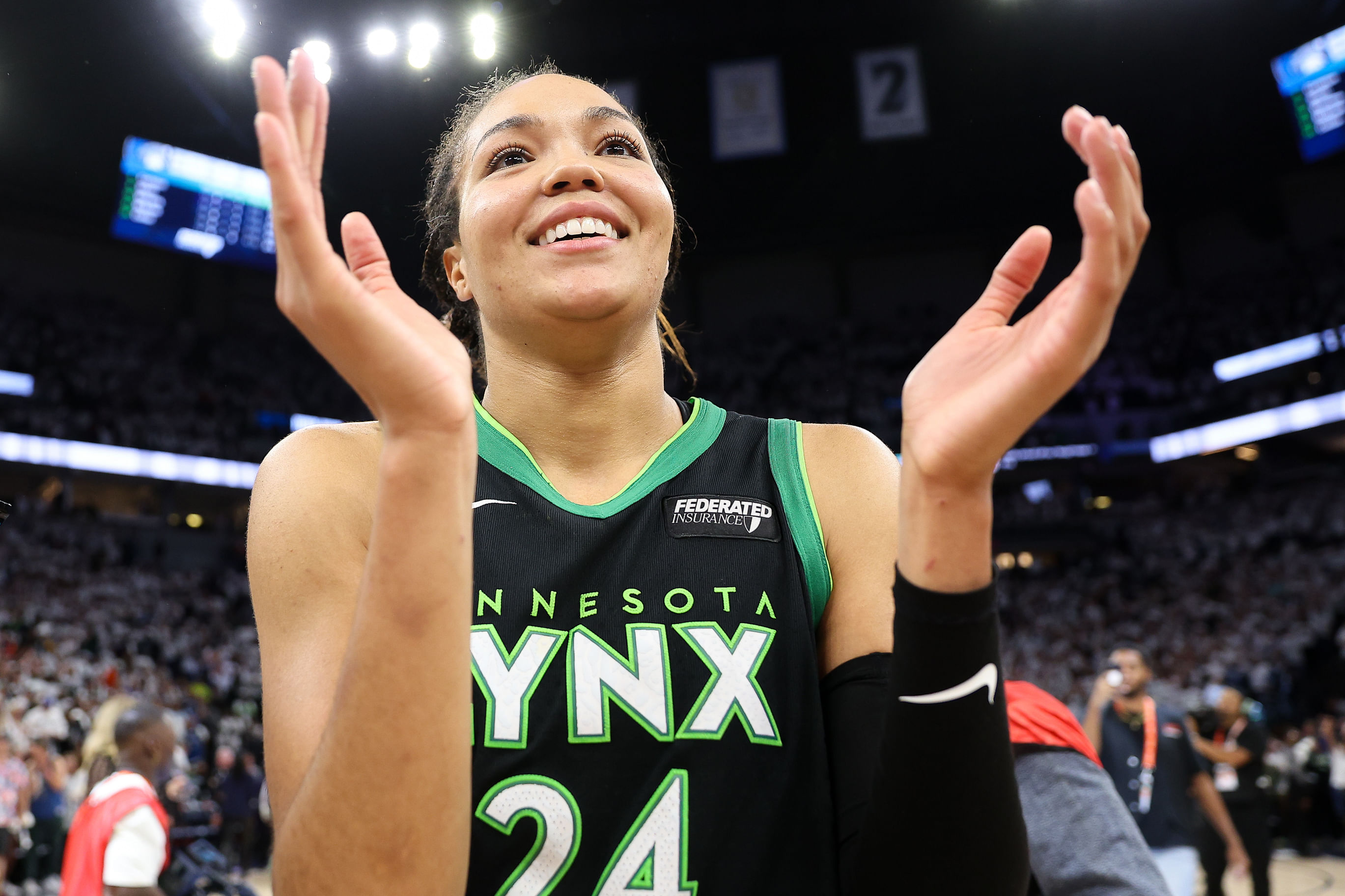 Oct 18, 2024; Minneapolis, Minnesota, USA; Minnesota Lynx forward Napheesa Collier (24) celebrates her teams win after game four of the 2024 WNBA Finals against the New York Liberty at Target Center. Mandatory Credit: Matt Krohn-Imagn Images - Source: Imagn