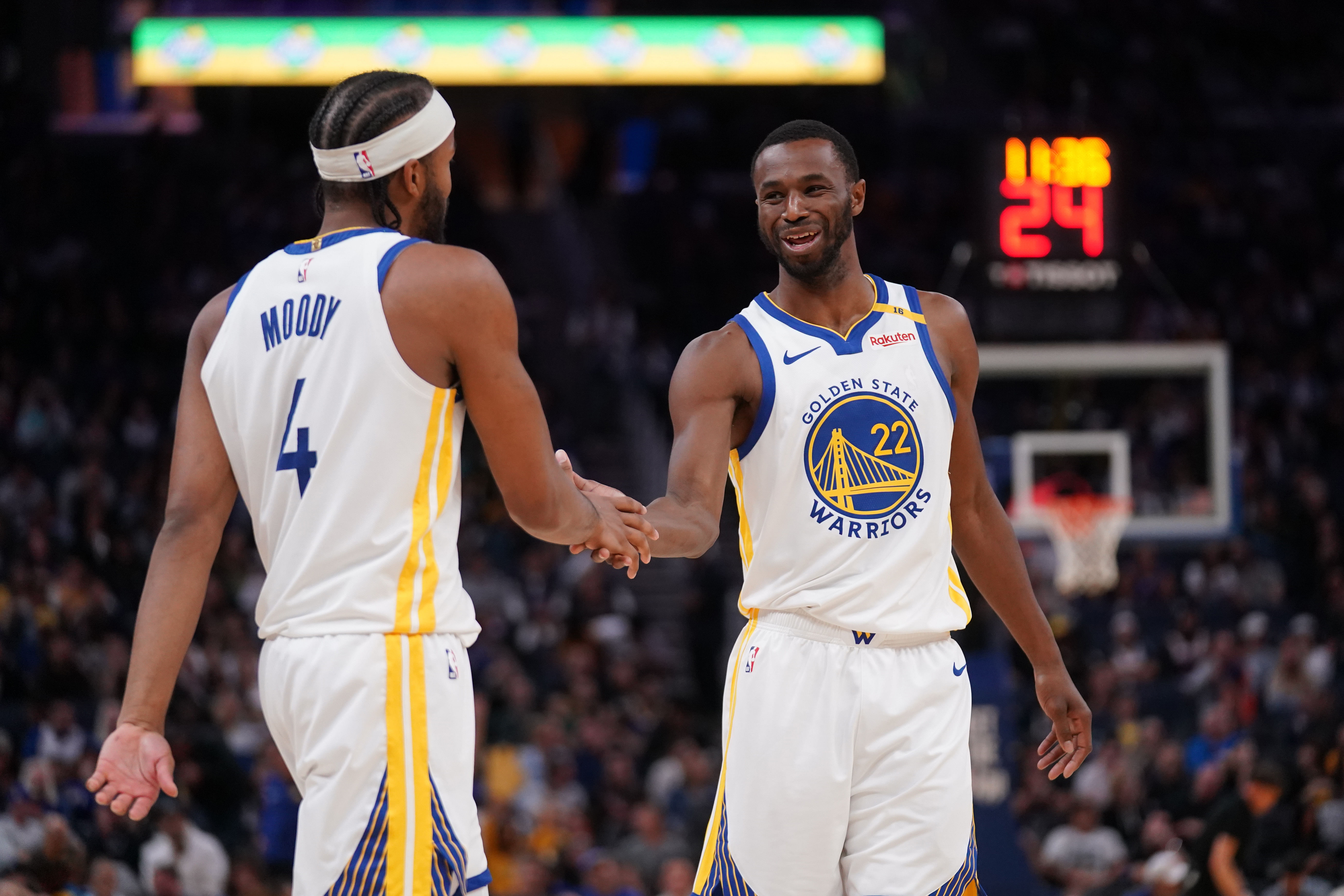 Golden State Warriors forward Andrew Wiggins congratulates guard Moses Moody after Moody made a basket against the Los Angeles Lakers at the Chase Center. Photo Credit: Imagn