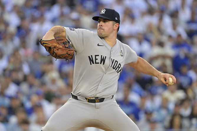 In Pictures: Carlos Rodon's wife Ashley celebrates Christmas with throwback Halloween snaps of Yankees ace and their kids