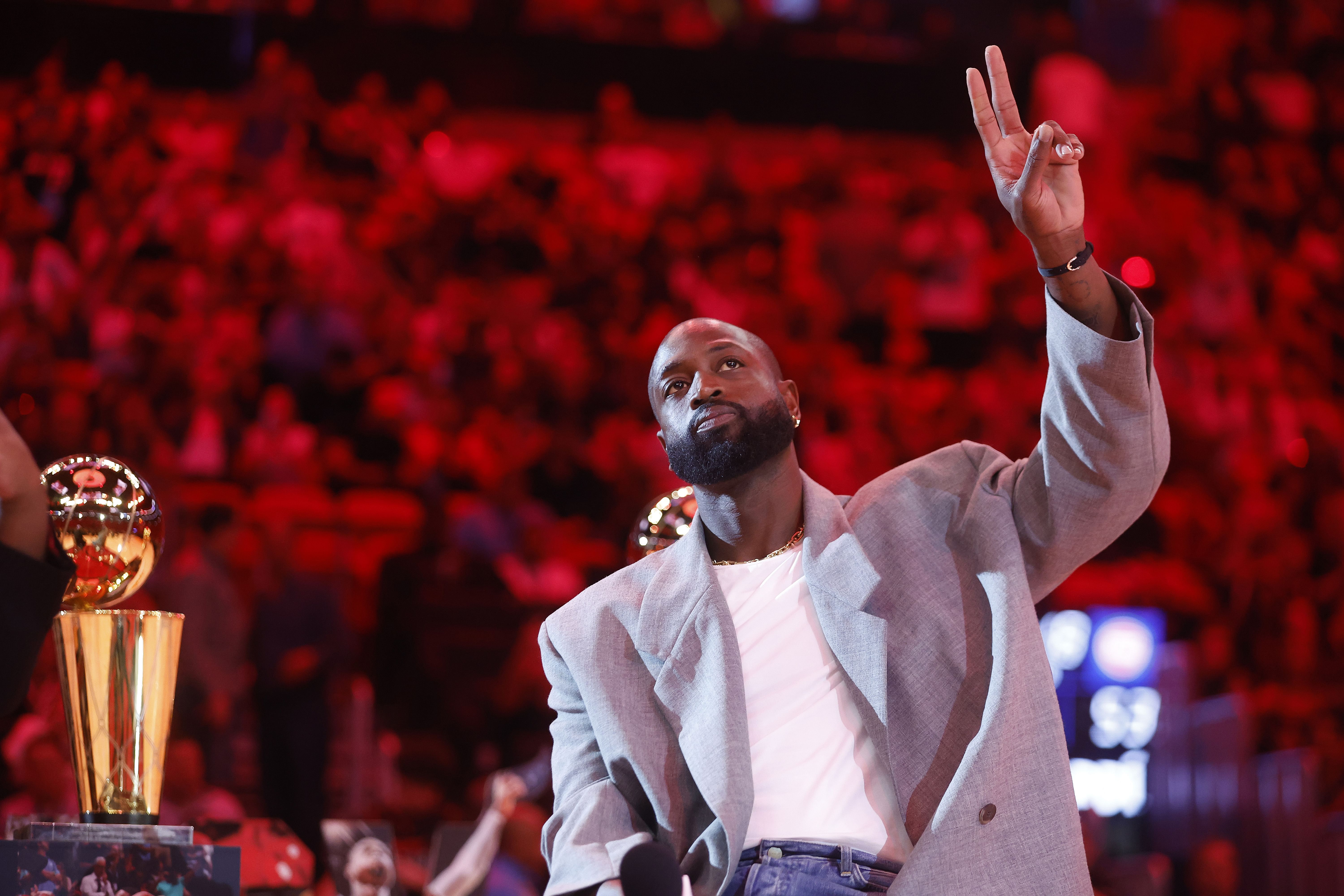 Oct 28, 2024; Miami, Florida, USA; Former Miami Heat guard Dwyane Wade is honored at halftime during the game against the Detroit Pistons at Kaseya Center. Mandatory Credit: Rhona Wise-Imagn Images - Source: Imagn