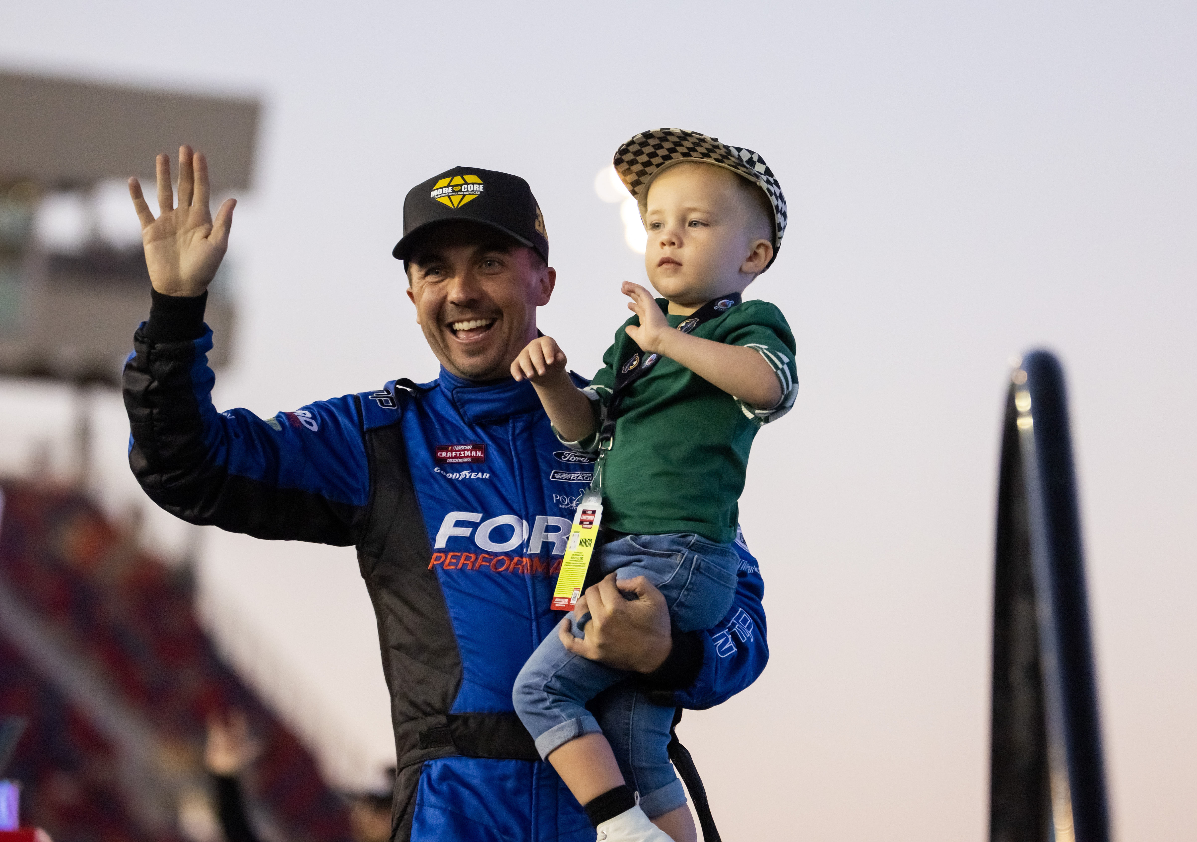 Frankie Muniz with son Mauz Muniz during the NASCAR Truck Series championship race at Phoenix Raceway.- Source: Imagn