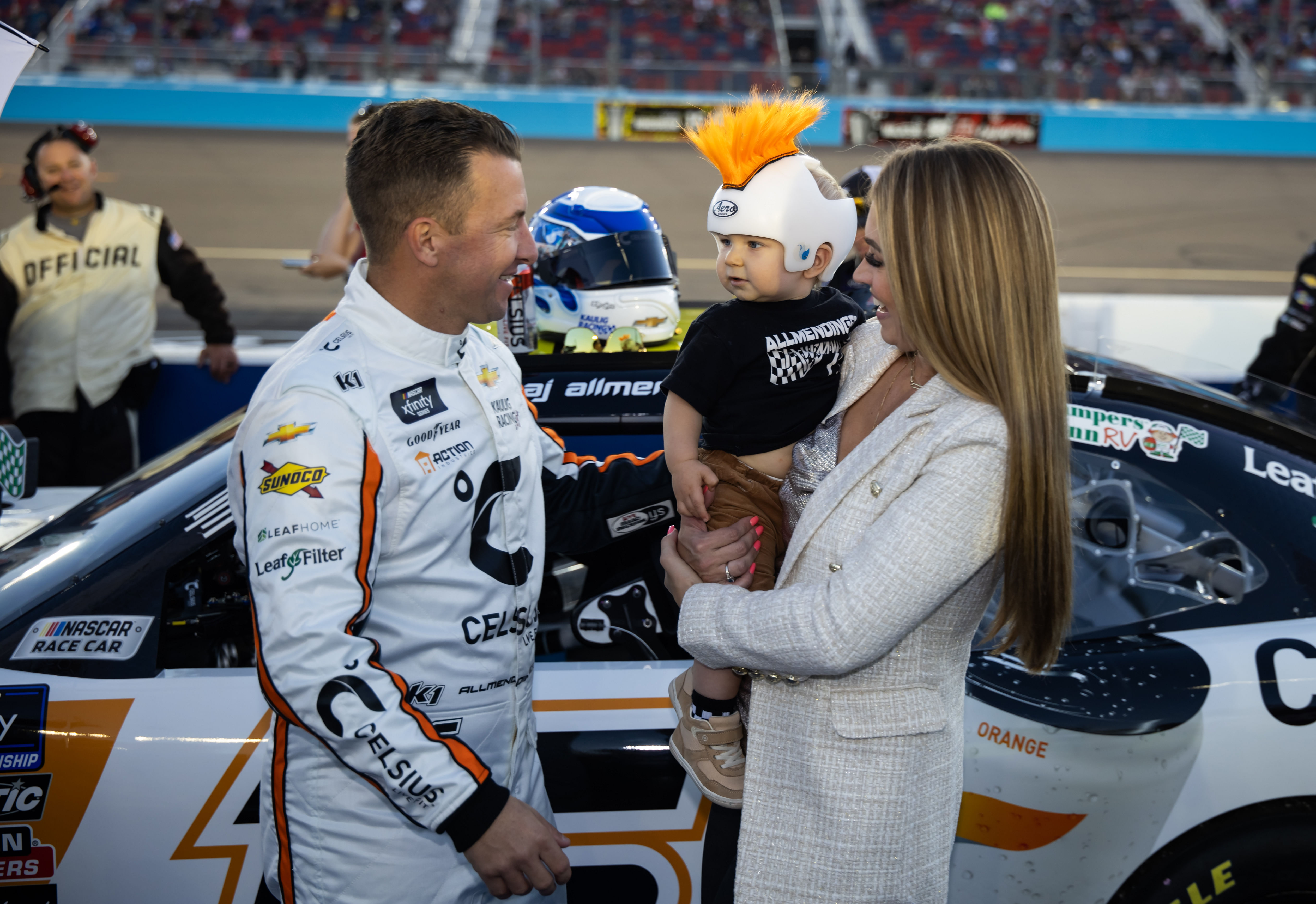 AJ Allmendinger with wife Tara Allmendinger and son Aero Allmendinger during the Championship race at Phoenix Raceway. Mandatory Credit: Mark J. Rebilas-Imagn Images