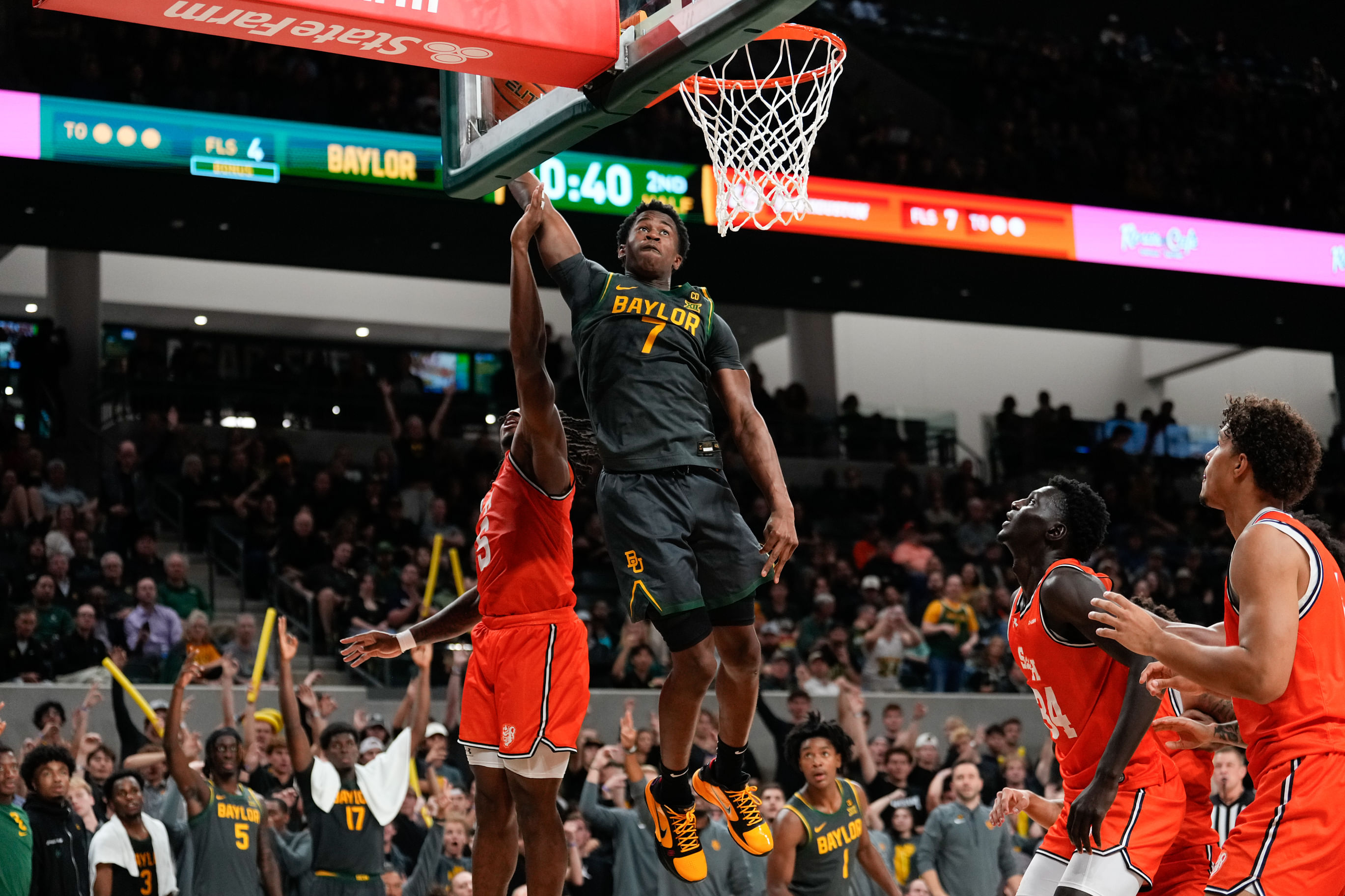 Baylor Bears guard VJ Edgecombe (7) dunks the ball ahead of Sam Houston State Bearkats guard Marcus Boykin (5) during the second half of their NCAA game. Photo: Imagn