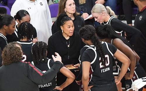 South Carolina coach Dawn Staley gives instructions to her players during a break in a game (Credits: IMAGN)